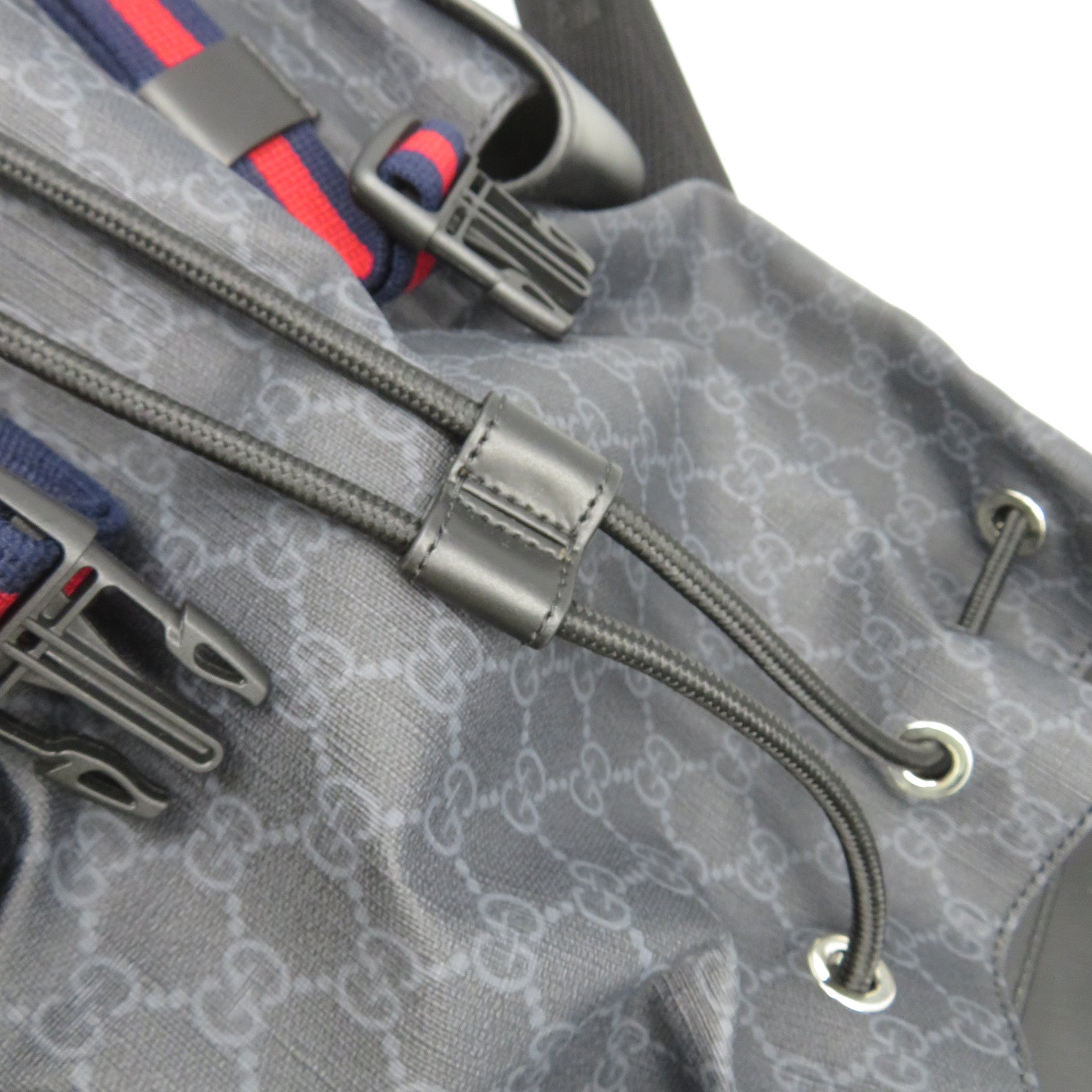 GUCCI 塗層帆布/皮革GG Supreme Backpack銀扣背包黑色/灰色