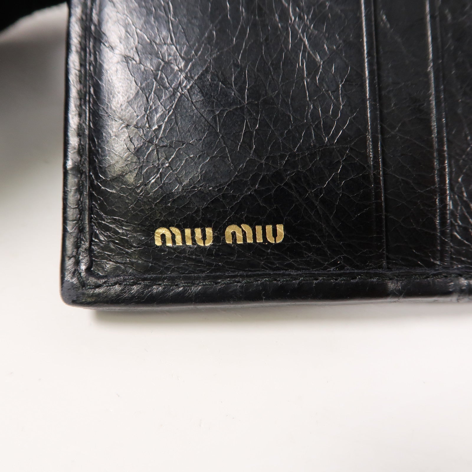 Miu Miu 【激減優惠】羊皮皮革Matelasse Wallet金扣鈕扣錢包黑色
