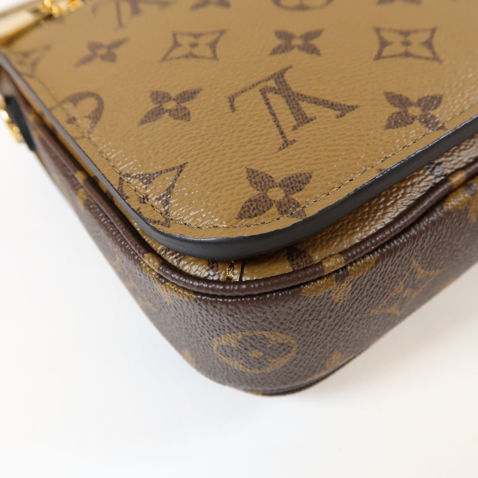 LOUIS VUITTON Monogram Reverse Pochette Métis金扣手挽肩背兩用袋啡色