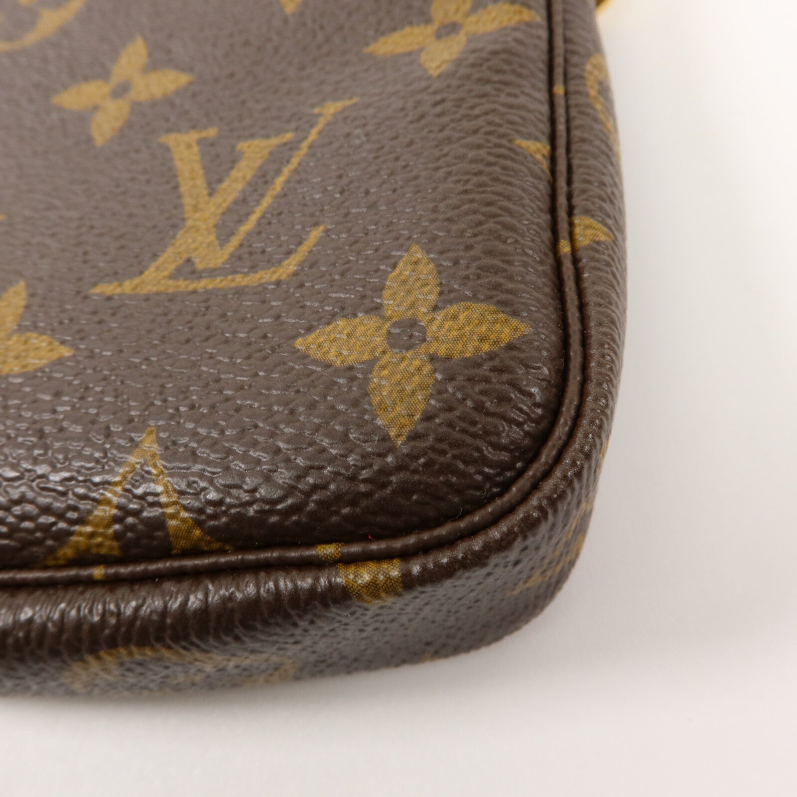 LOUIS VUITTON Monogram Mini Pochette Accessoires金扣手挽袋