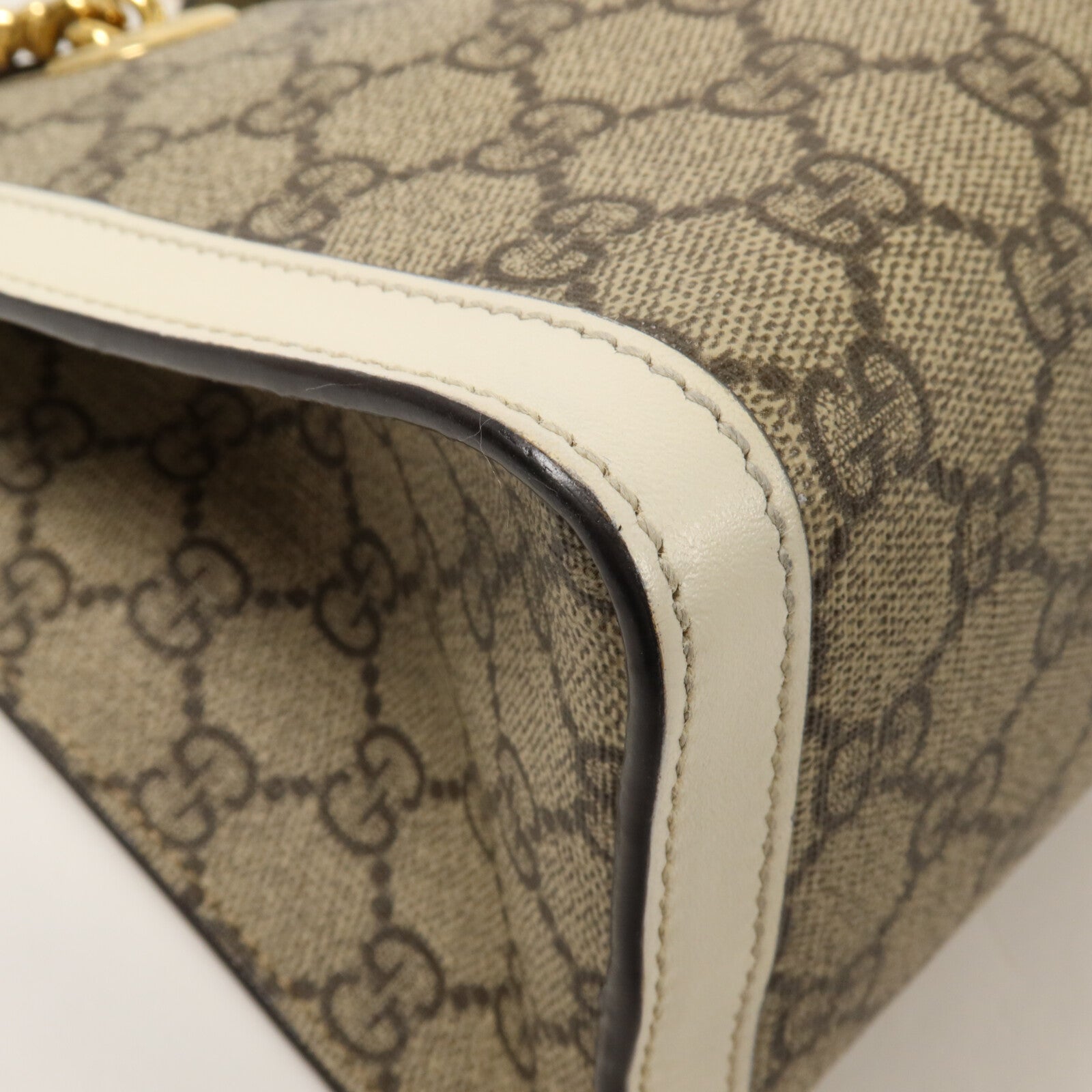 GUCCI 塗層帆布Padlock GG Small鏈帶肩背袋