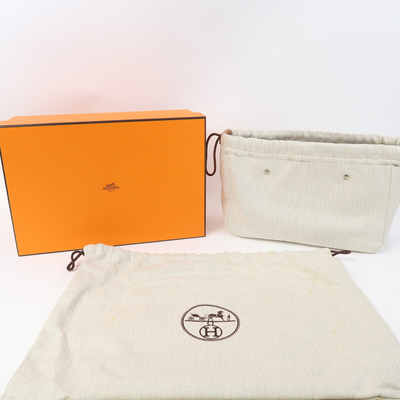 HERMES 帆布Fourbi 25 Pouch銀扣手拿包米色