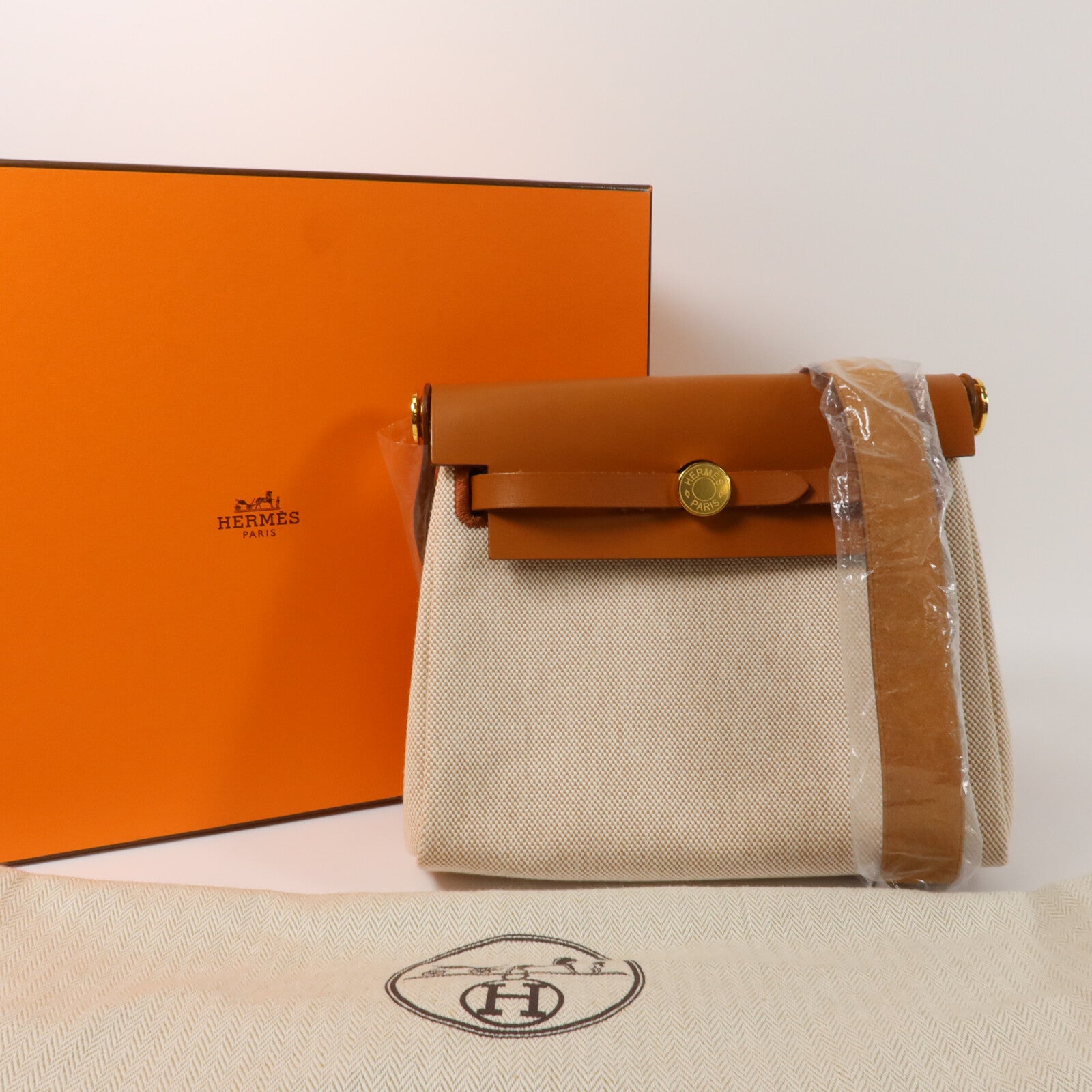 HERMES 帆布Mini Herbag肩背袋Ecru Beige/Fauve