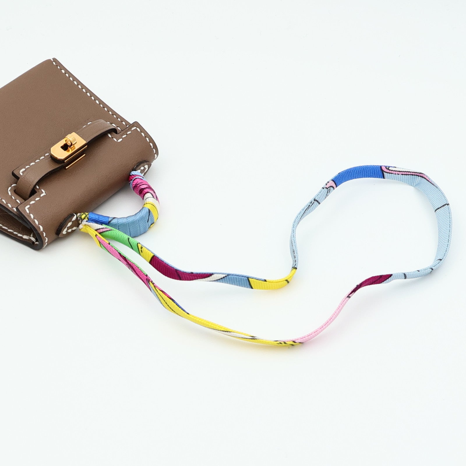 HERMES Tadelakt皮革Kelly Twilly Bag Charm金扣掛飾Etoupe