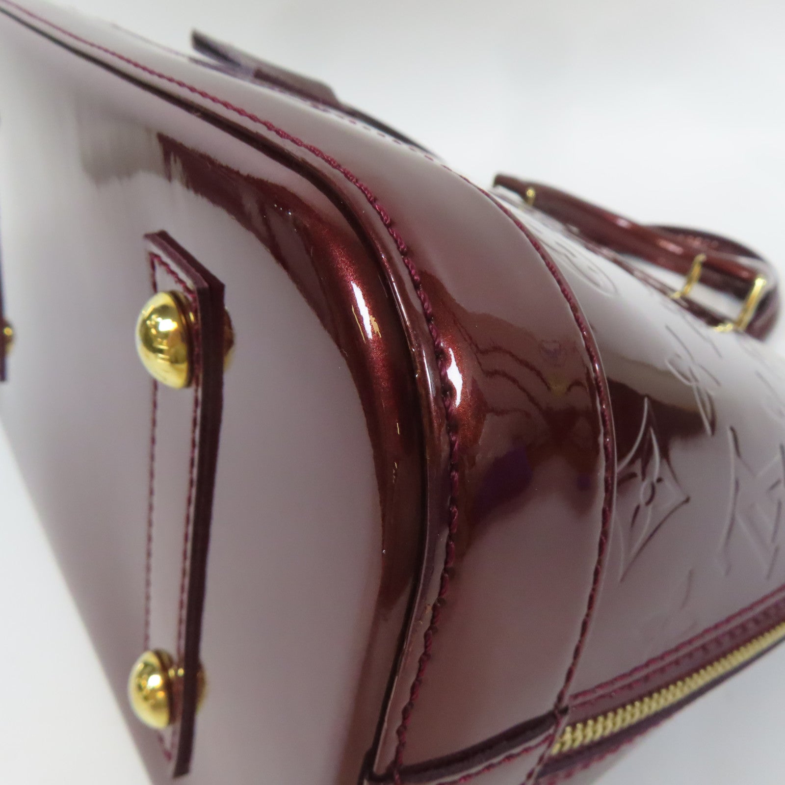 LOUIS VUITTON Vernis Alma PM金扣手挽袋深紅色