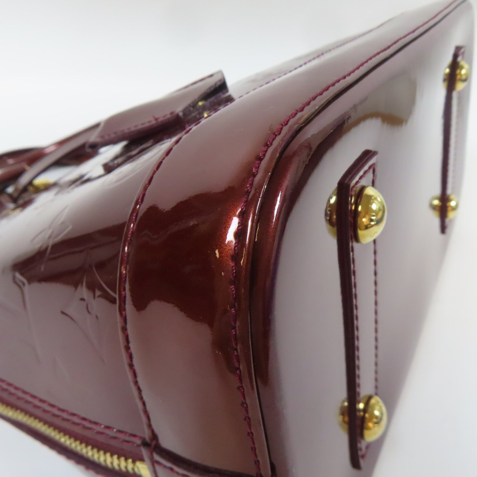 LOUIS VUITTON Vernis Alma PM金扣手挽袋深紅色