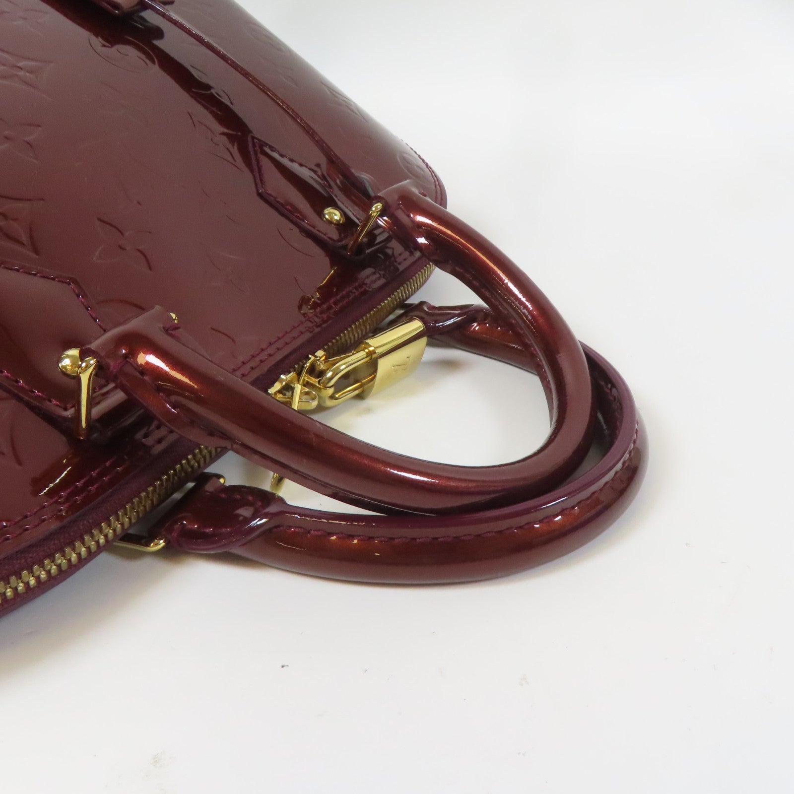 LOUIS VUITTON Vernis Alma PM金扣手挽袋深紅色