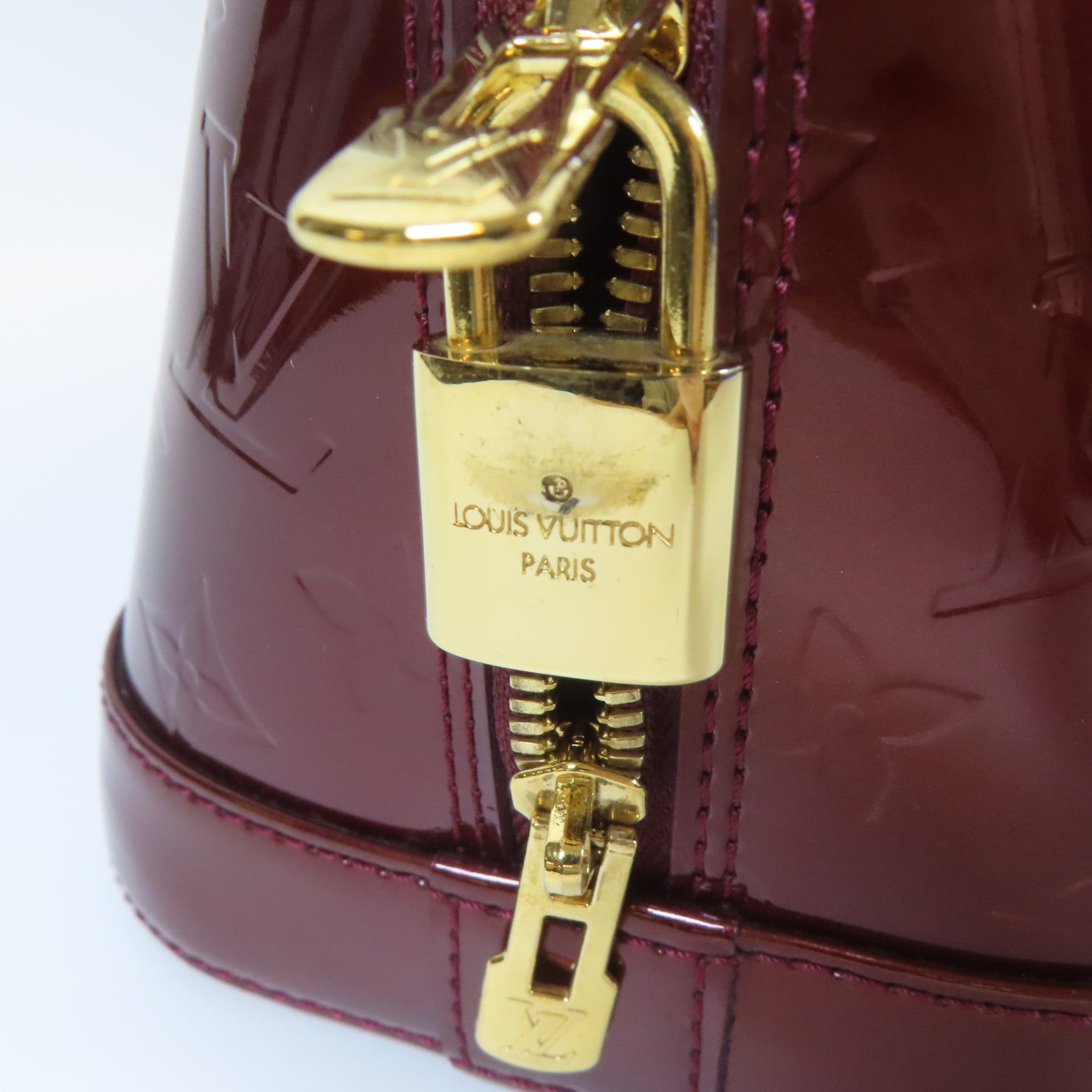 LOUIS VUITTON Vernis Alma PM金扣手挽袋深紅色