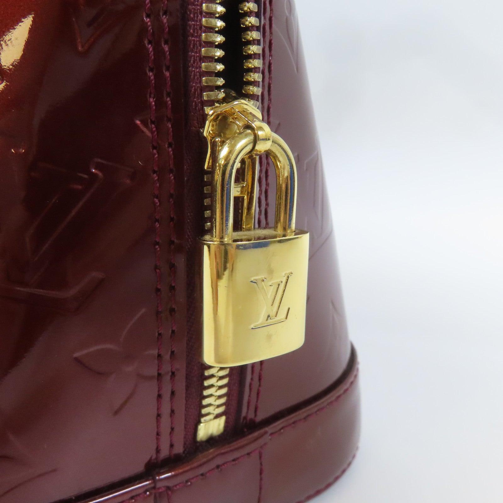 LOUIS VUITTON Vernis Alma PM金扣手挽袋深紅色