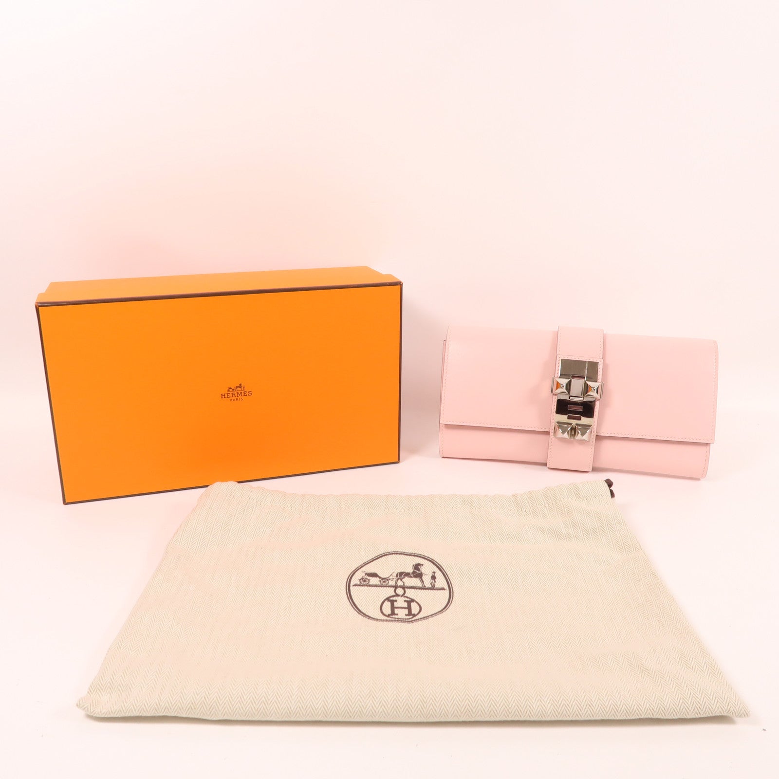 HERMES 皮革CDC Medor Clutch銀扣手拿包櫻花粉色