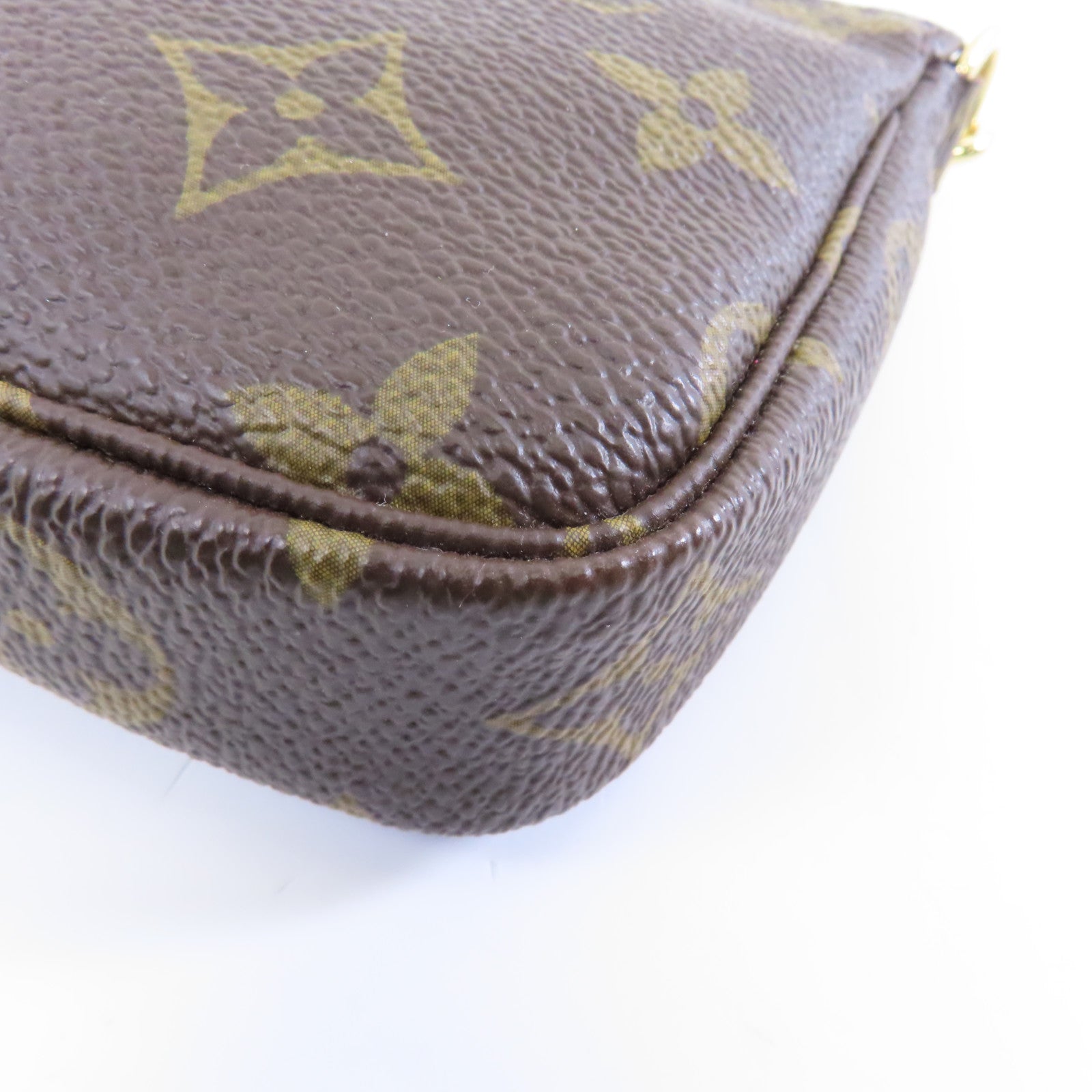 LOUIS VUITTON Monogram Pochette Accessories金扣手挽袋棕色