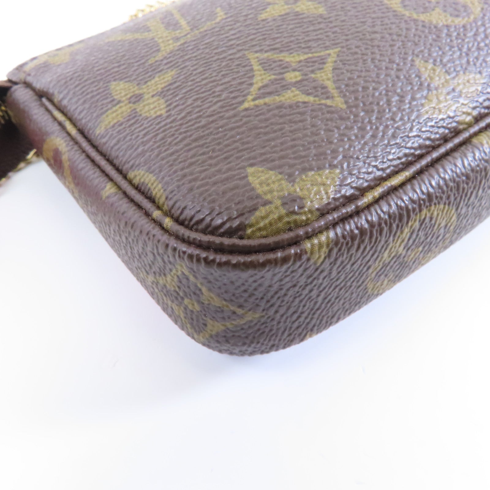 LOUIS VUITTON Monogram Pochette Accessories金扣手挽袋棕色