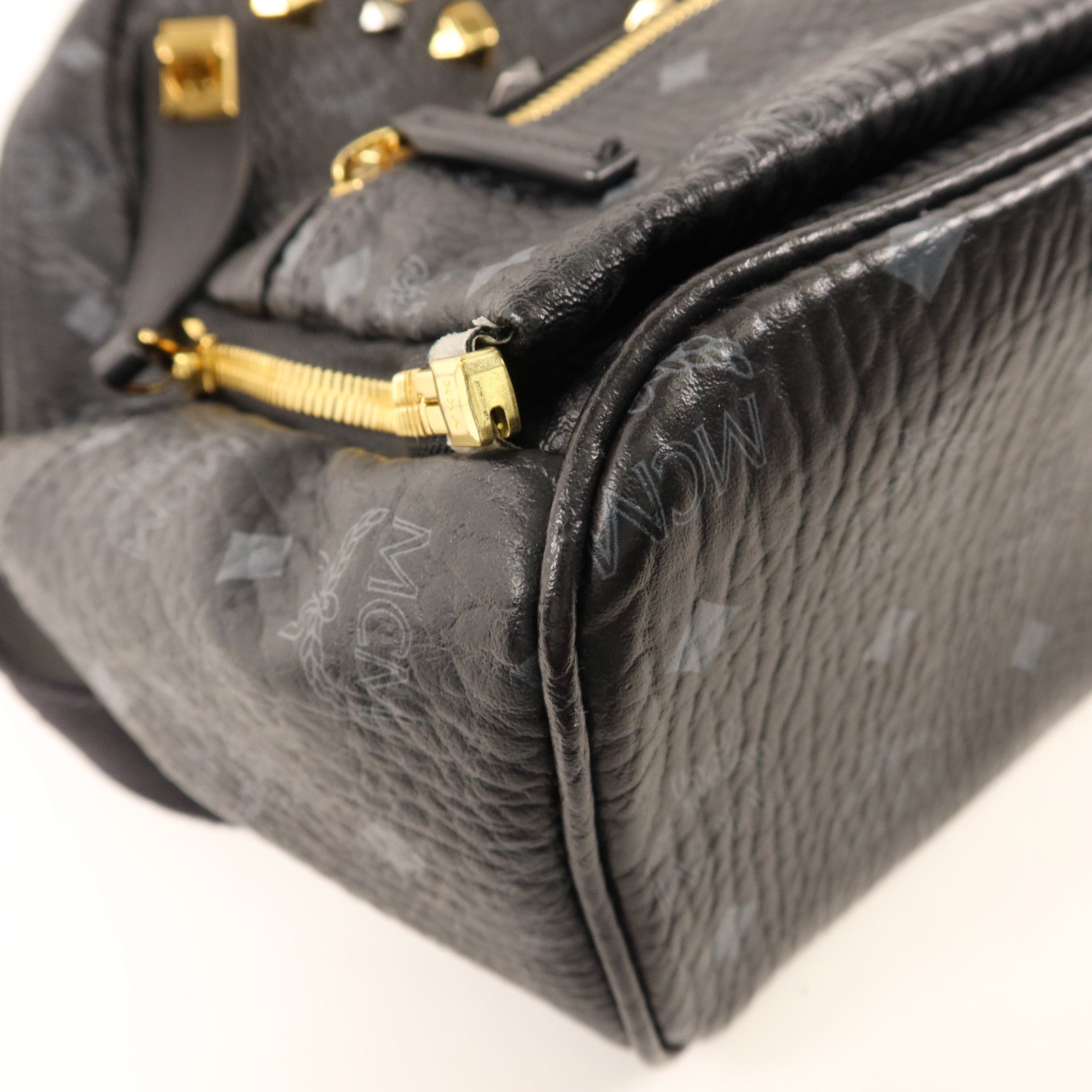 MCM 牛皮皮革Backpack金扣背包