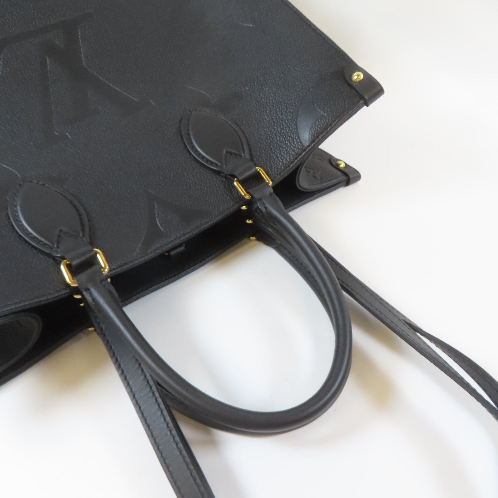 LOUIS VUITTON Monogram Empreinte On The Go MM金扣手挽肩背兩用袋黑色