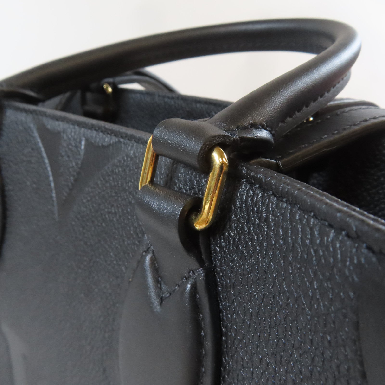 LOUIS VUITTON Monogram Empreinte On The Go MM金扣手挽肩背兩用袋黑色