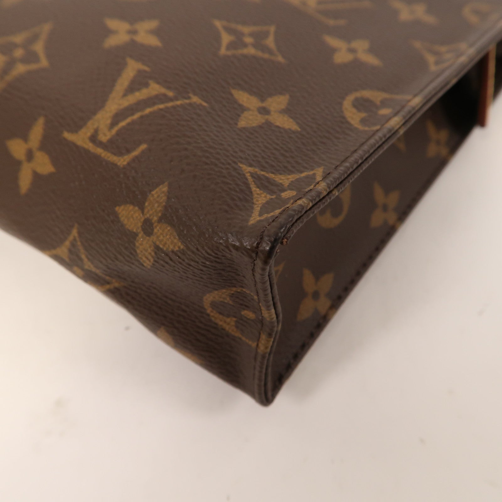 LOUIS VUITTON Monogram Pouch金扣手拿包啡色