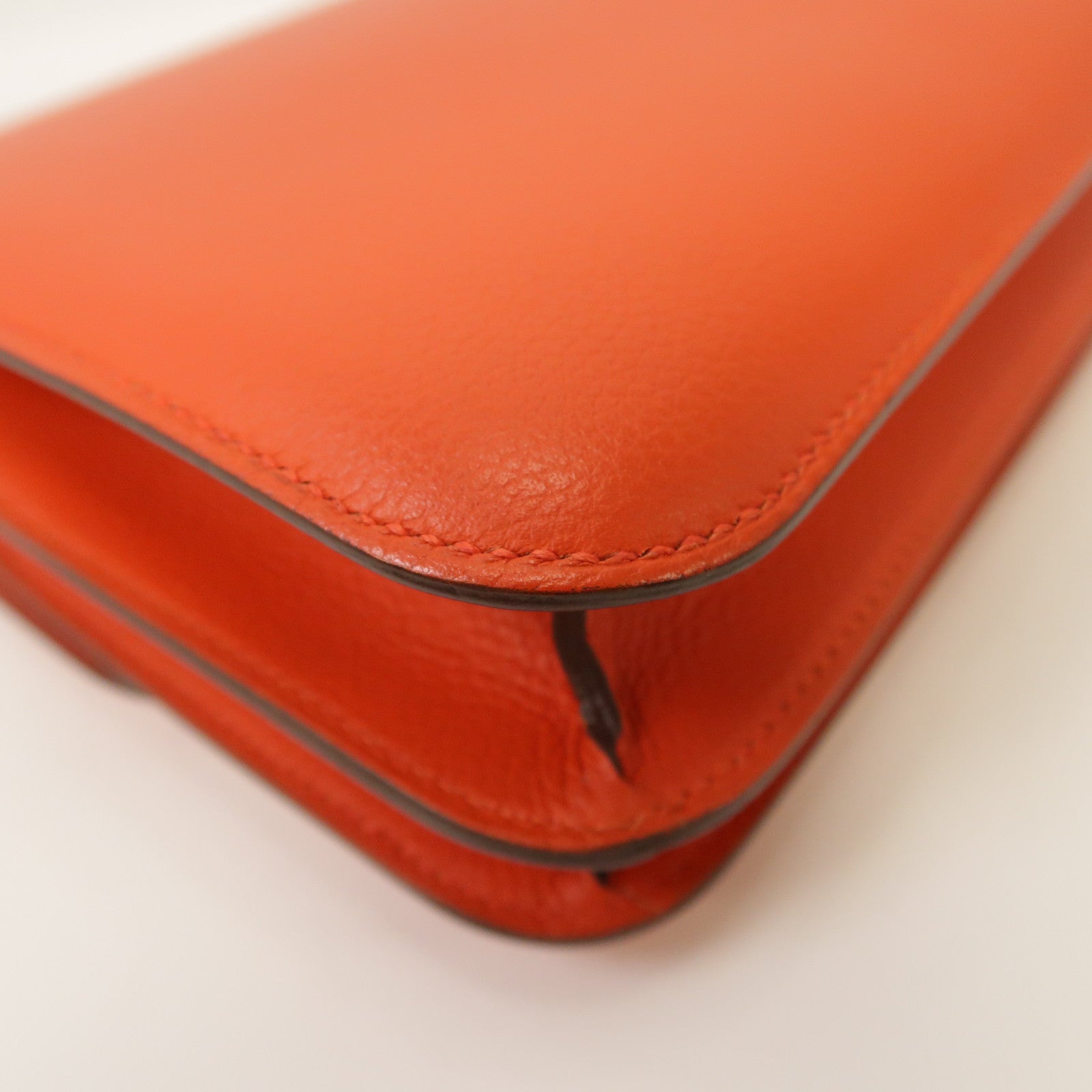 HERMES Evercolor皮革Constance Mini銀扣肩背袋Capucine橙色