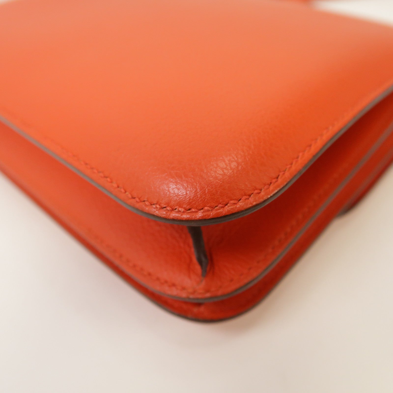 HERMES Evercolor皮革Constance Mini銀扣肩背袋Capucine橙色