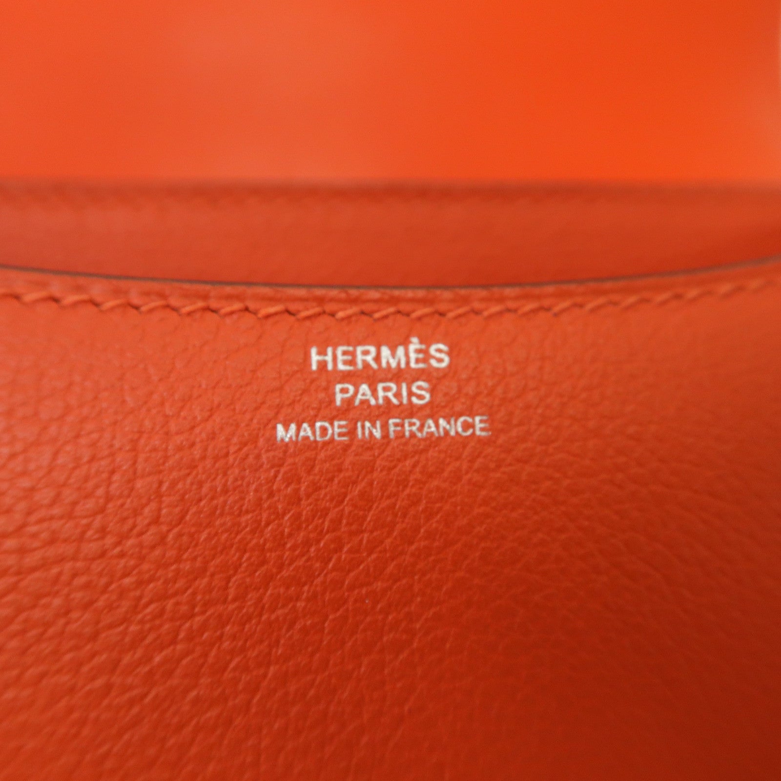 HERMES Evercolor皮革Constance Mini銀扣肩背袋Capucine橙色