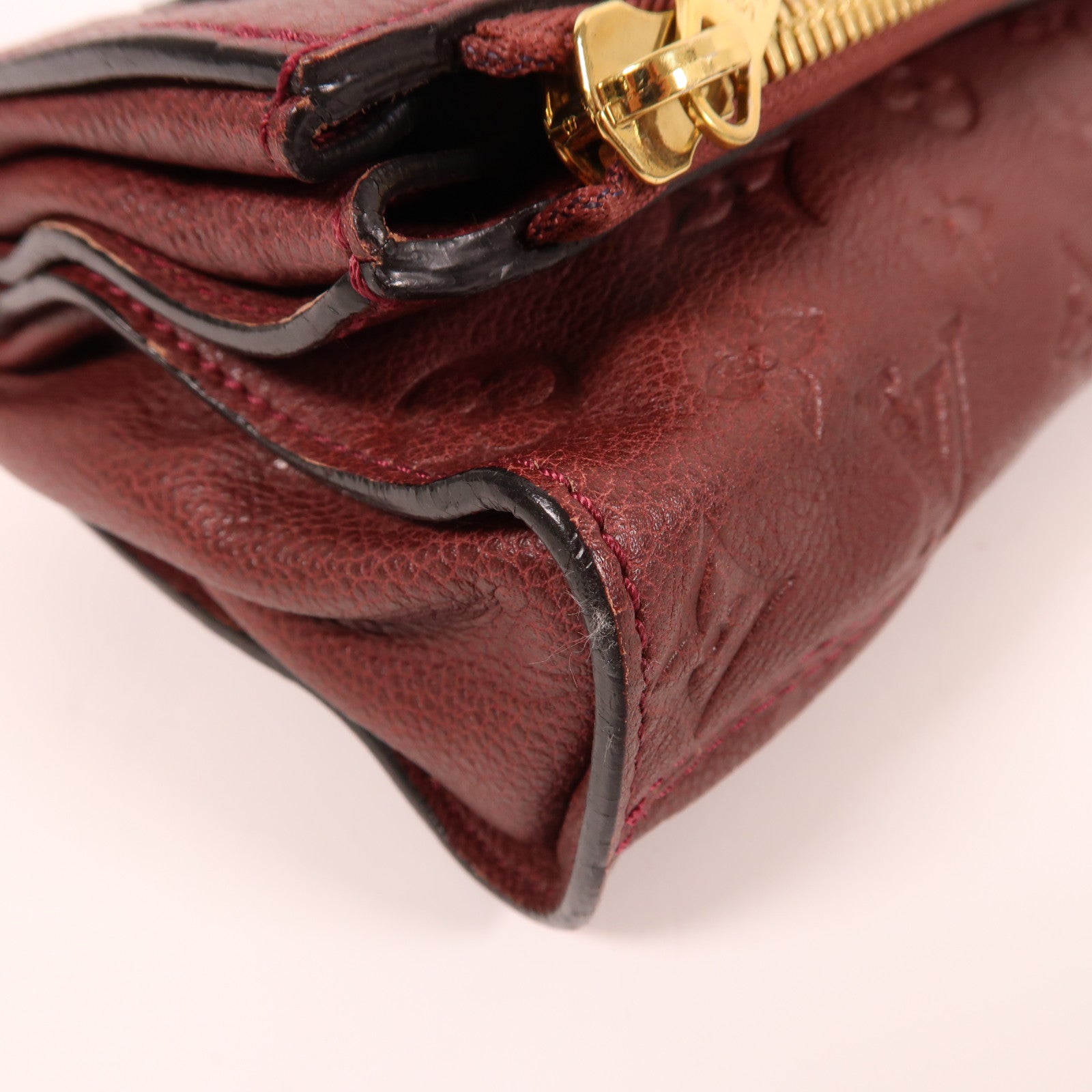 LOUIS VUITTON Monogram Empreinte Petillante Clutch金扣手拿包紅色