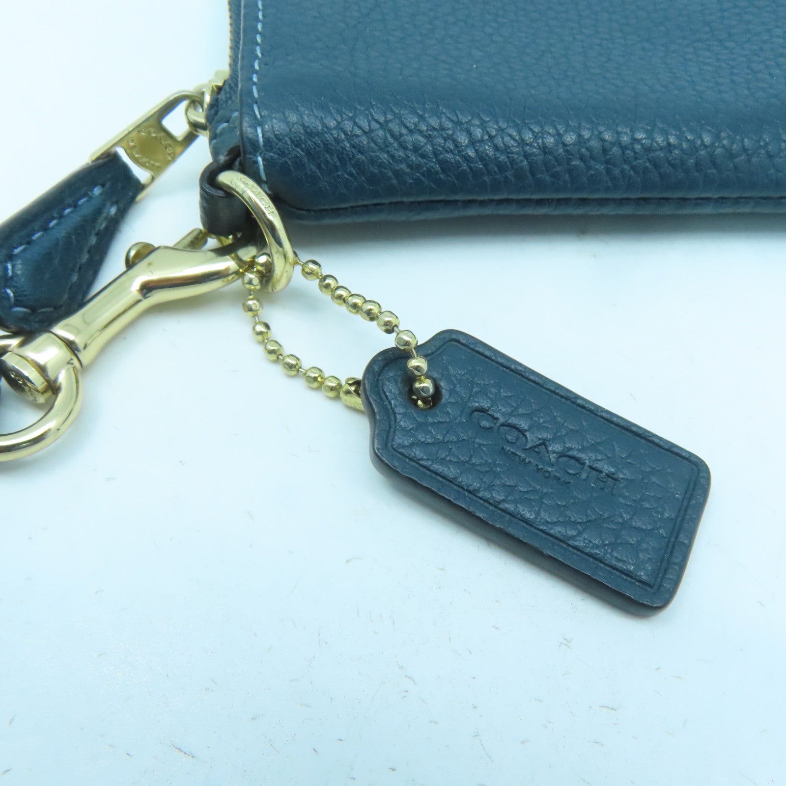 COACH 【激減優惠】牛皮皮革Pouch金扣手拿包綠色