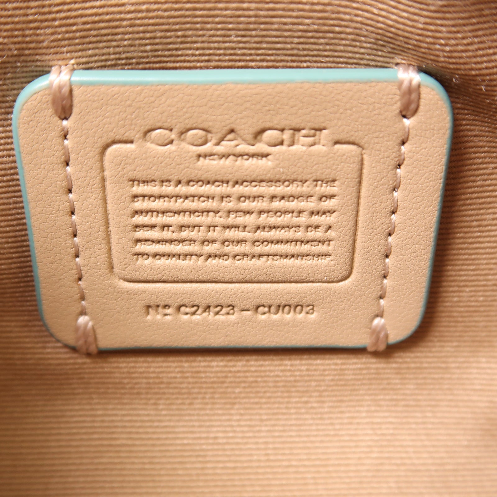 COACH 帆布/皮革Barrel銀扣手挽袋