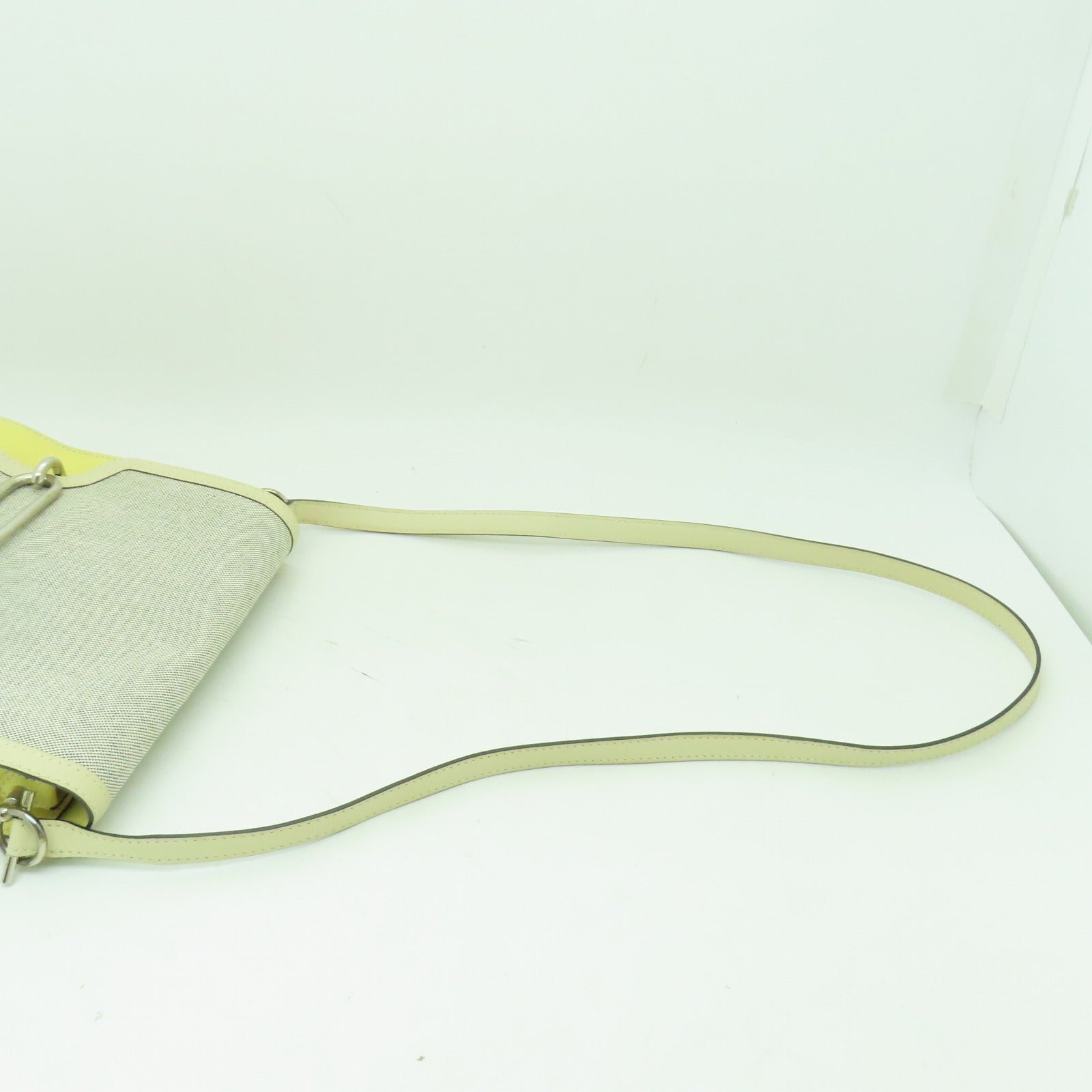 HERMES 【清倉大減價】Evercolor皮革/Toile H Roulis 23銀扣肩背袋黃色/灰色