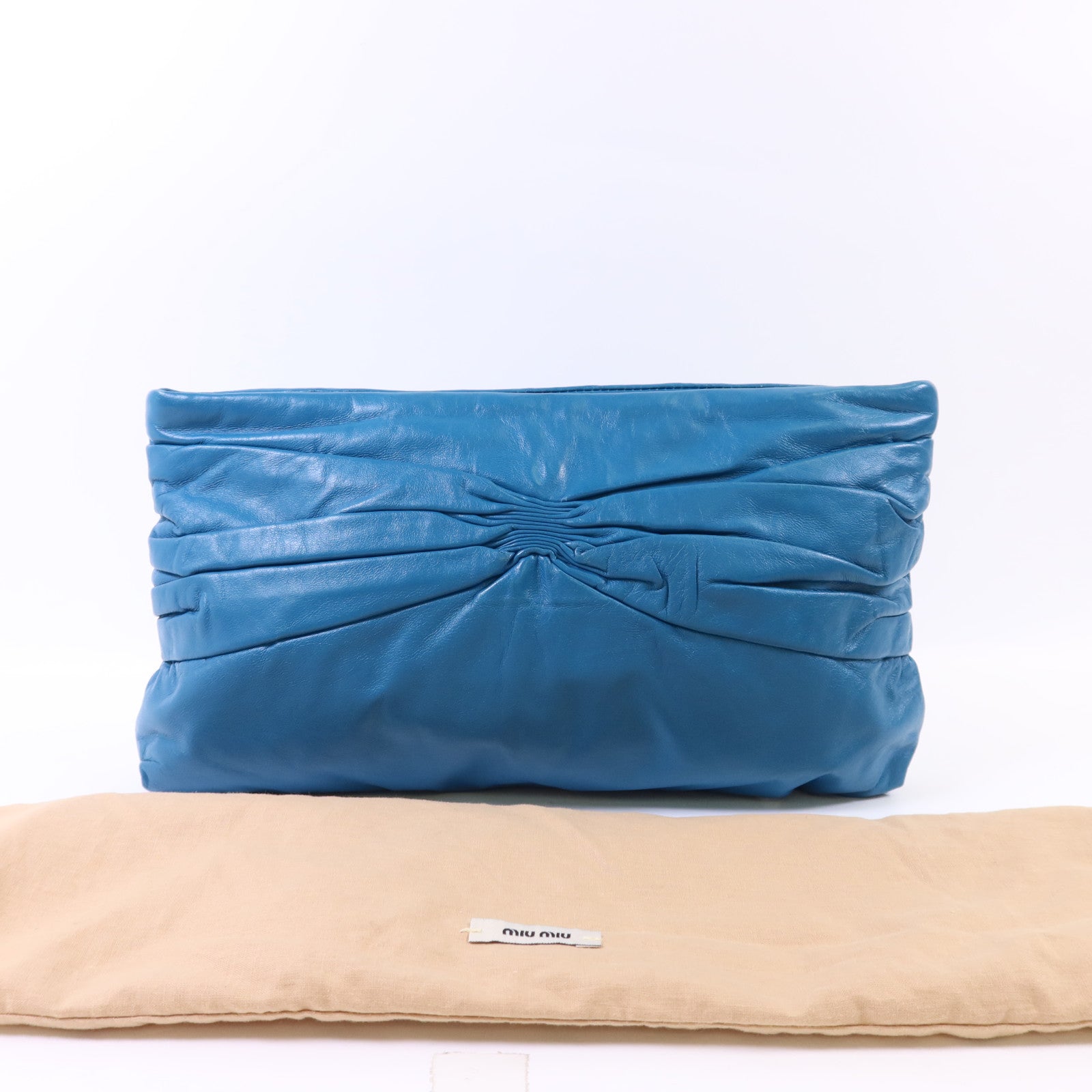 Miu Miu 牛皮皮革Clutch Bag金扣手拿包