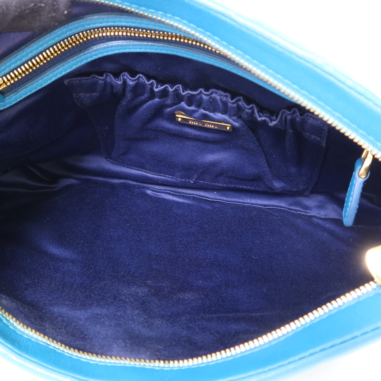 Miu Miu 牛皮皮革Clutch Bag金扣手拿包