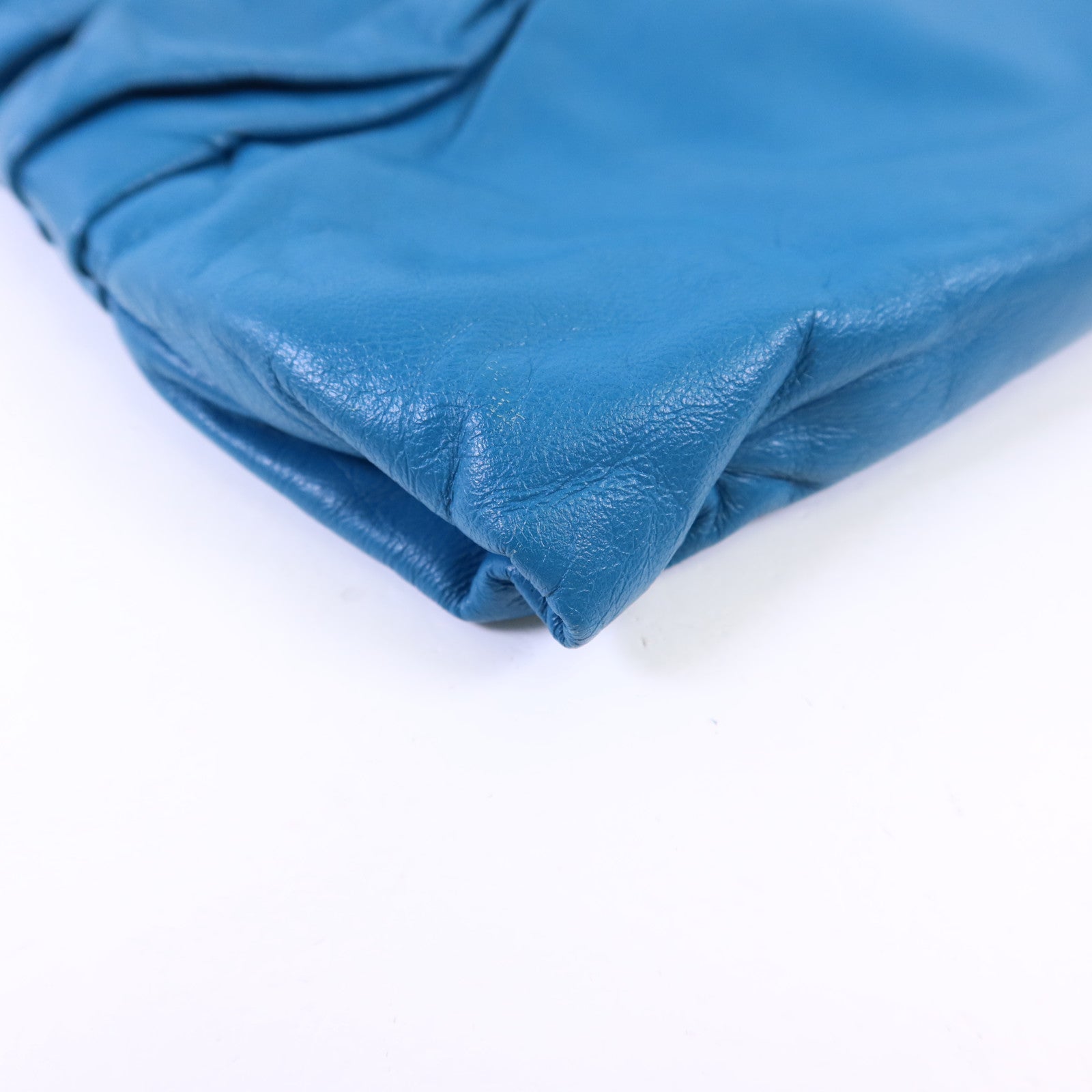 Miu Miu 牛皮皮革Clutch Bag金扣手拿包