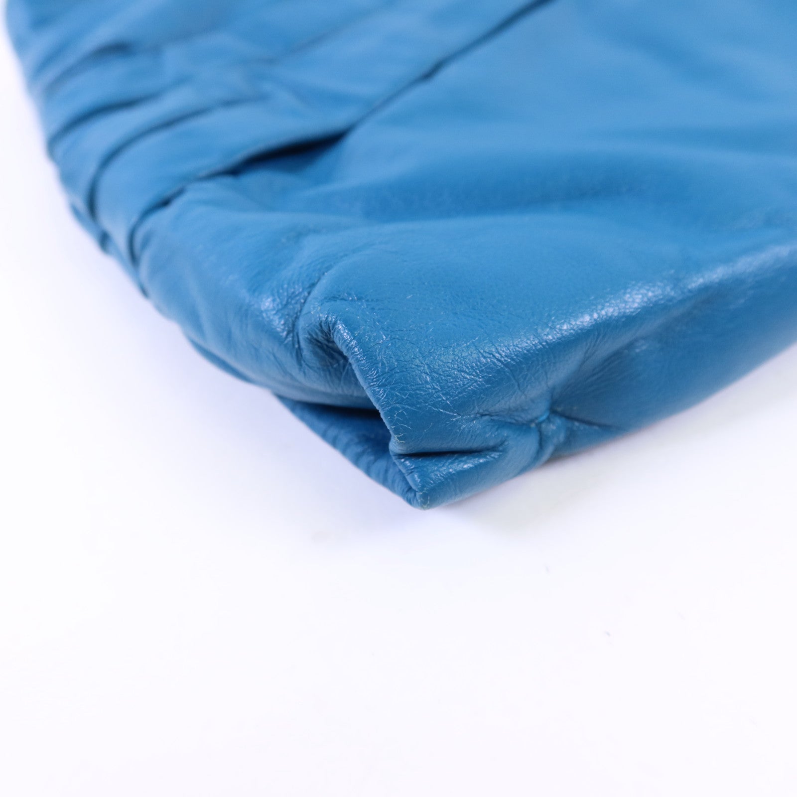 Miu Miu 牛皮皮革Clutch Bag金扣手拿包