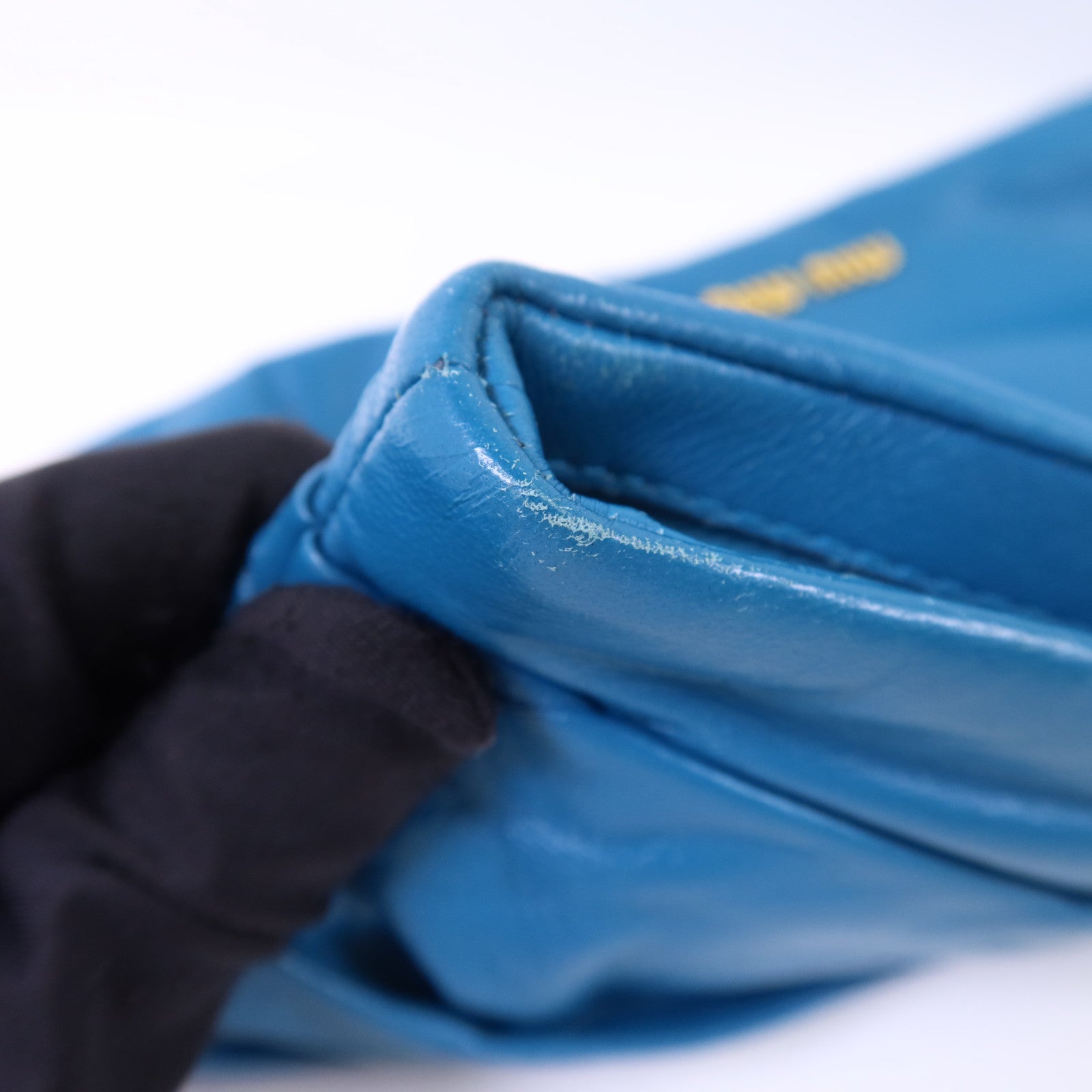 Miu Miu 牛皮皮革Clutch Bag金扣手拿包