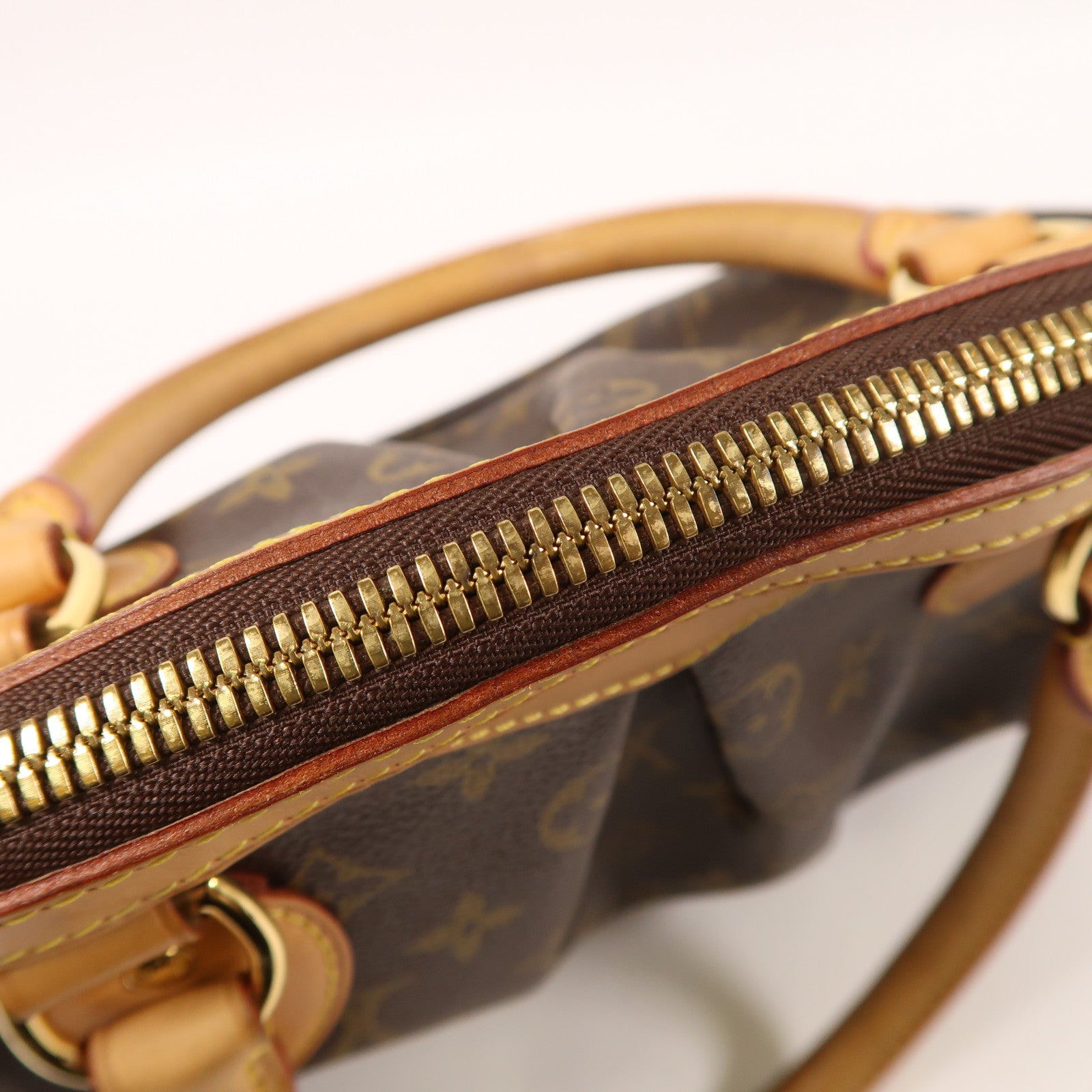 LOUIS VUITTON Monogram Tivoli PM金扣手挽袋棕色
