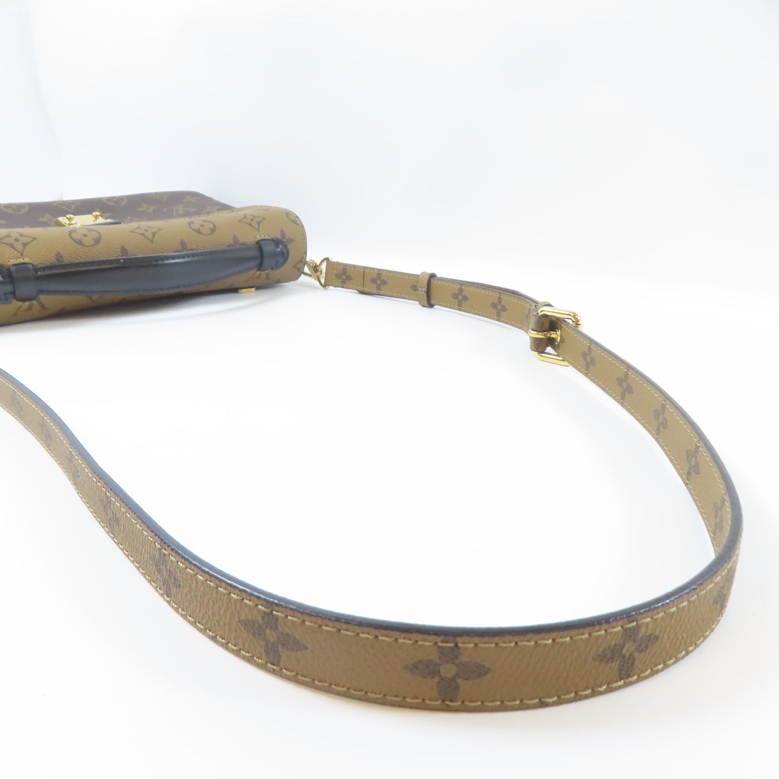 LOUIS VUITTON 【激減優惠】Monogram Reverse Pochette Métis金扣手挽肩背兩用袋啡色