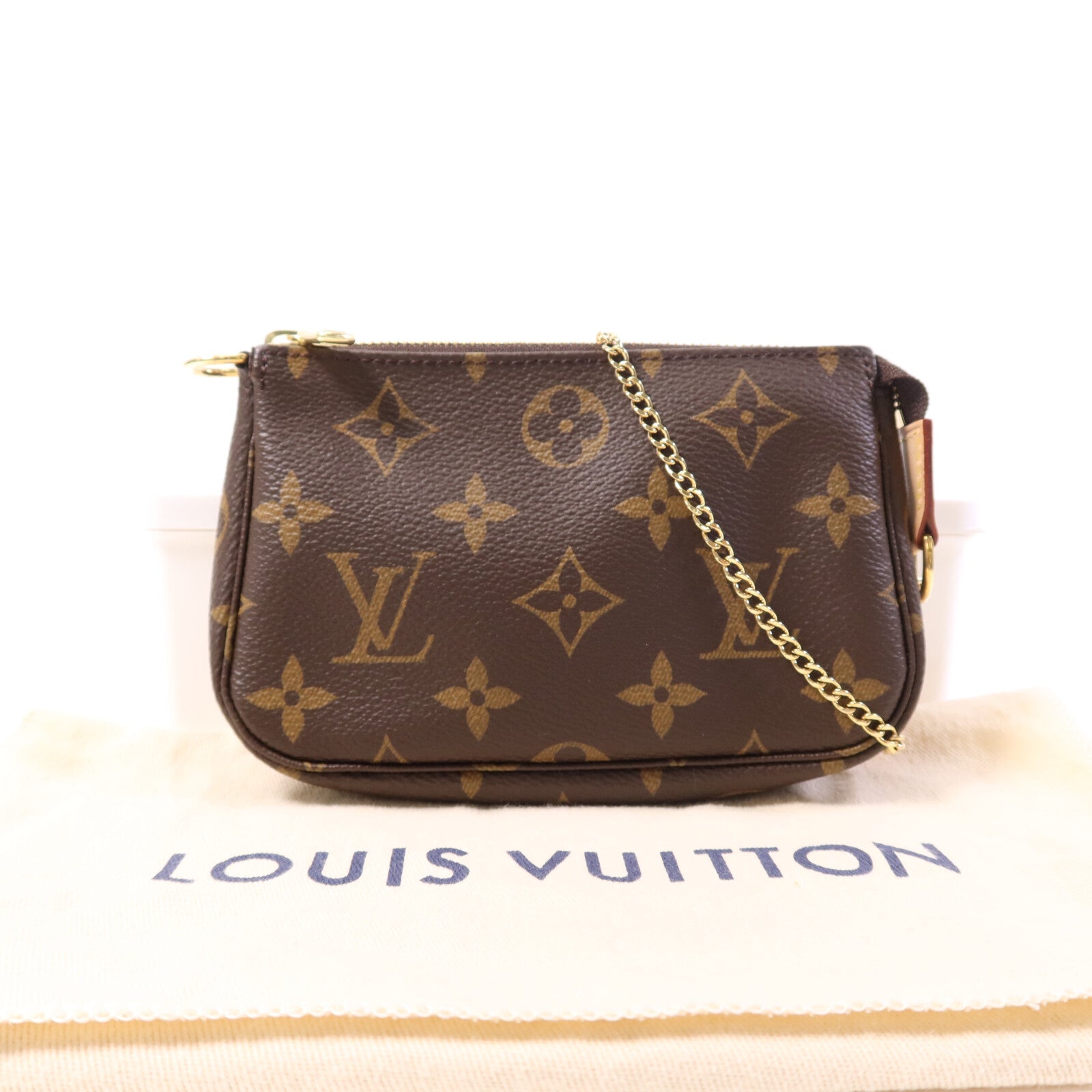 LOUIS VUITTON Monogram Mini Pochette Accessoires金扣手挽袋