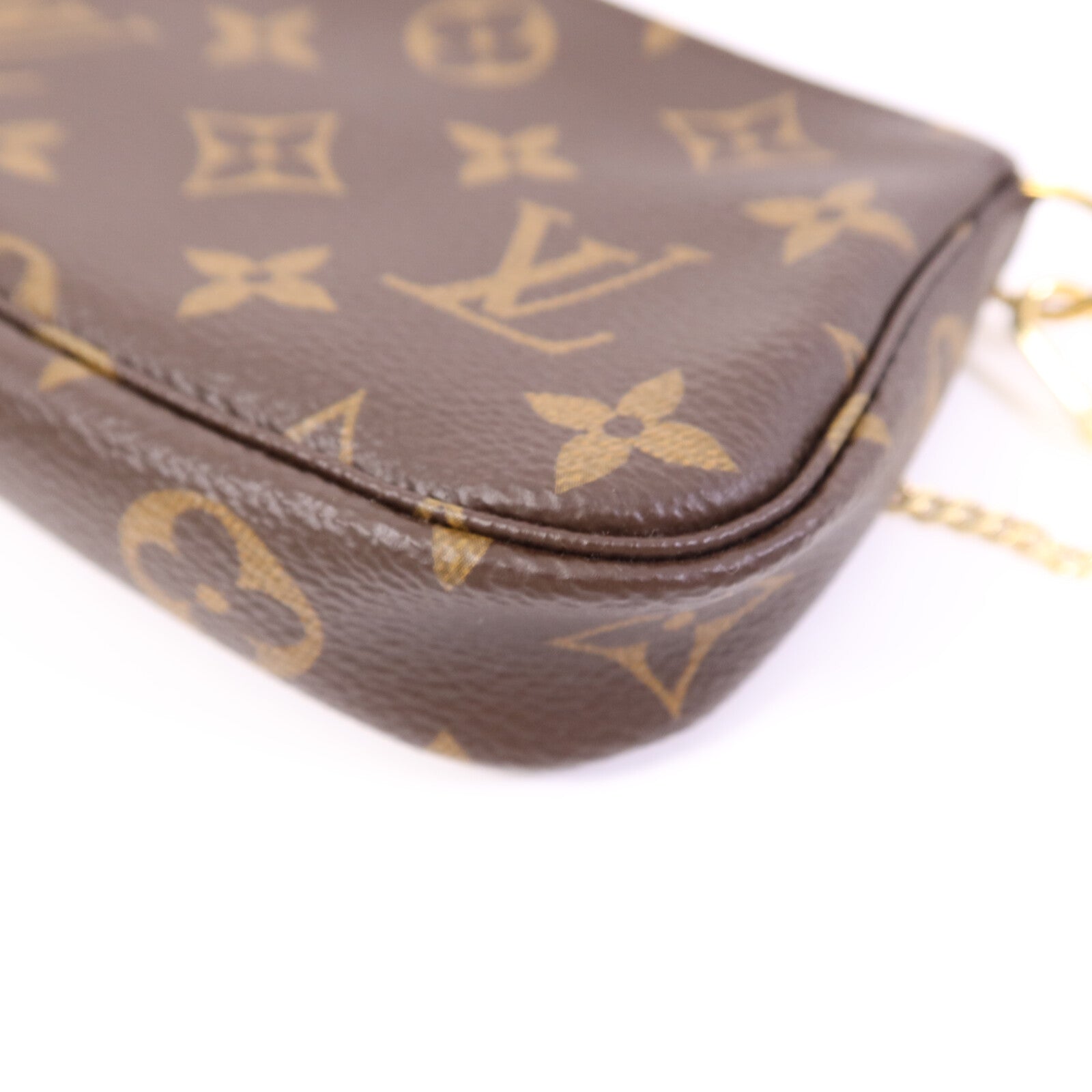 LOUIS VUITTON Monogram Mini Pochette Accessoires金扣手挽袋