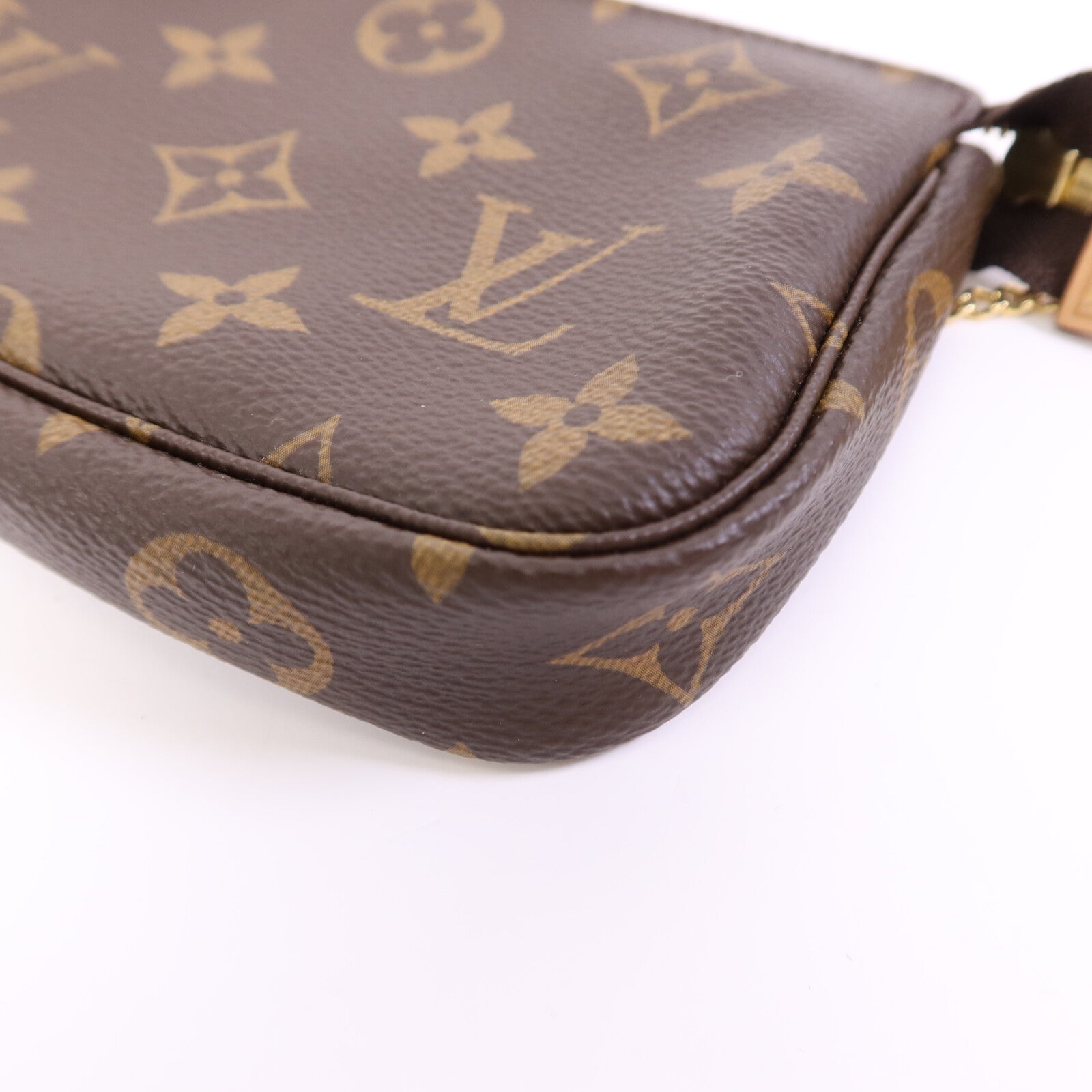LOUIS VUITTON Monogram Mini Pochette Accessoires金扣手挽袋