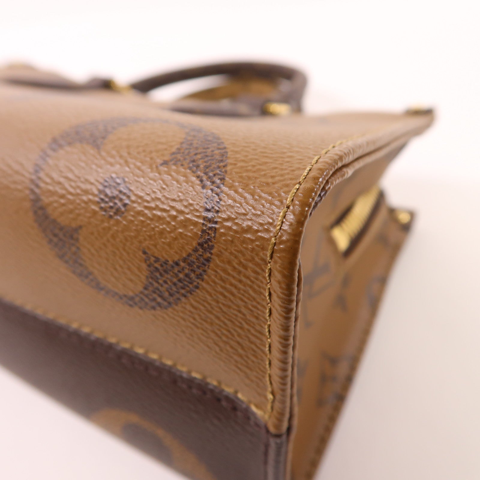 LOUIS VUITTON Monogram On The Go East West金扣手挽肩背兩用袋