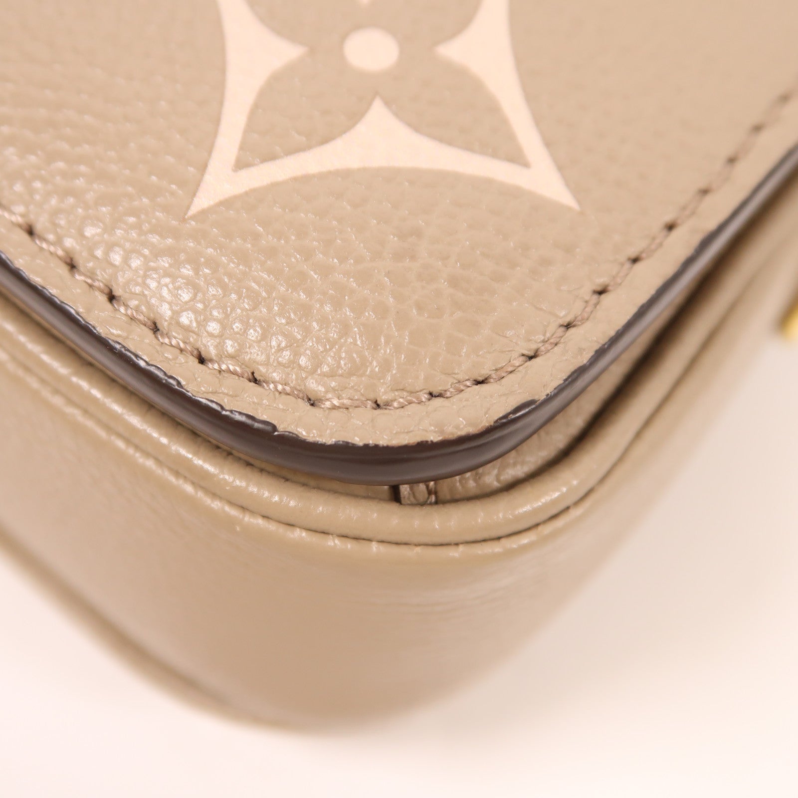 LOUIS VUITTON Monogram Empreinte Pochette Métis East West金扣手挽肩背兩用袋