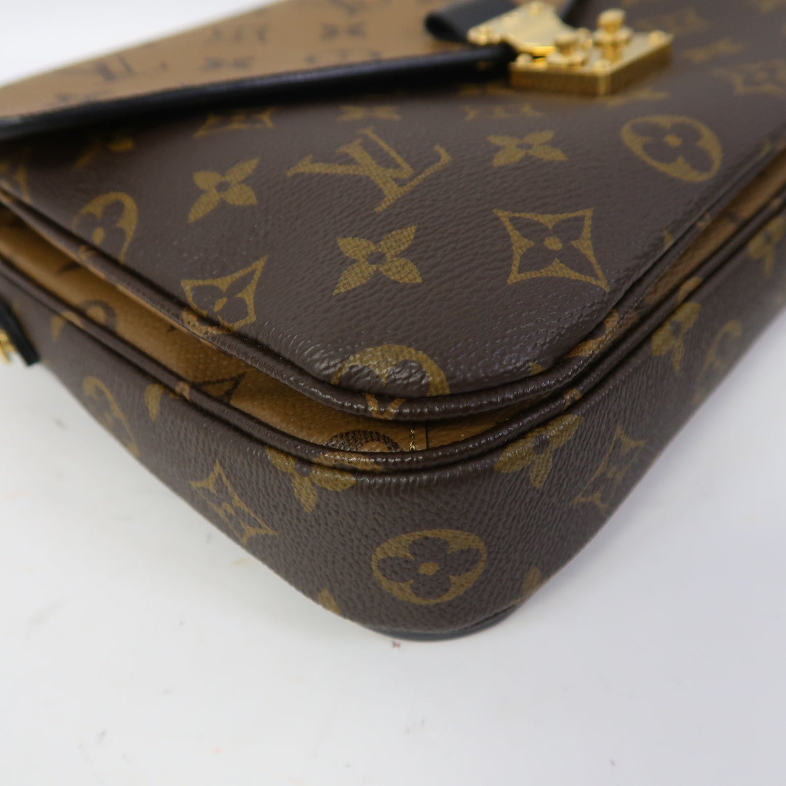 LOUIS VUITTON Monogram Reverse Pochette Metis金扣手挽肩背兩用袋啡色