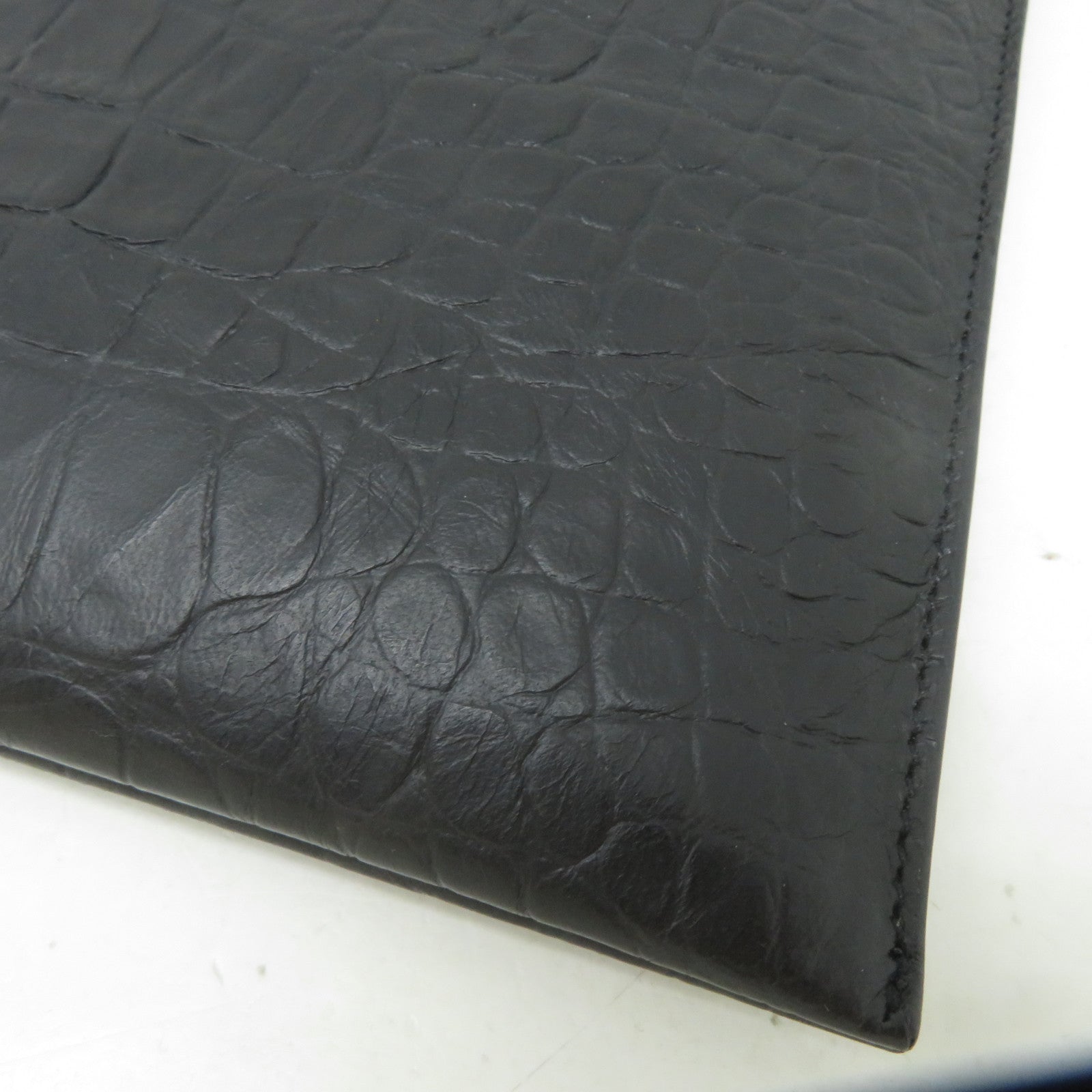 SAINT LAURENT 皮革Clutch Bag黑扣手拿包黑色