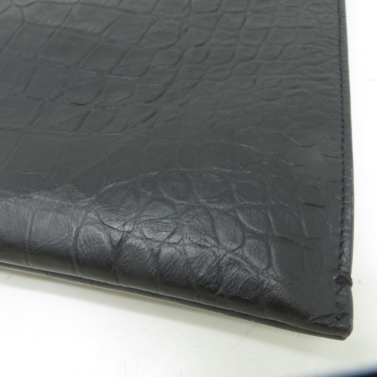 SAINT LAURENT 皮革Clutch Bag黑扣手拿包黑色