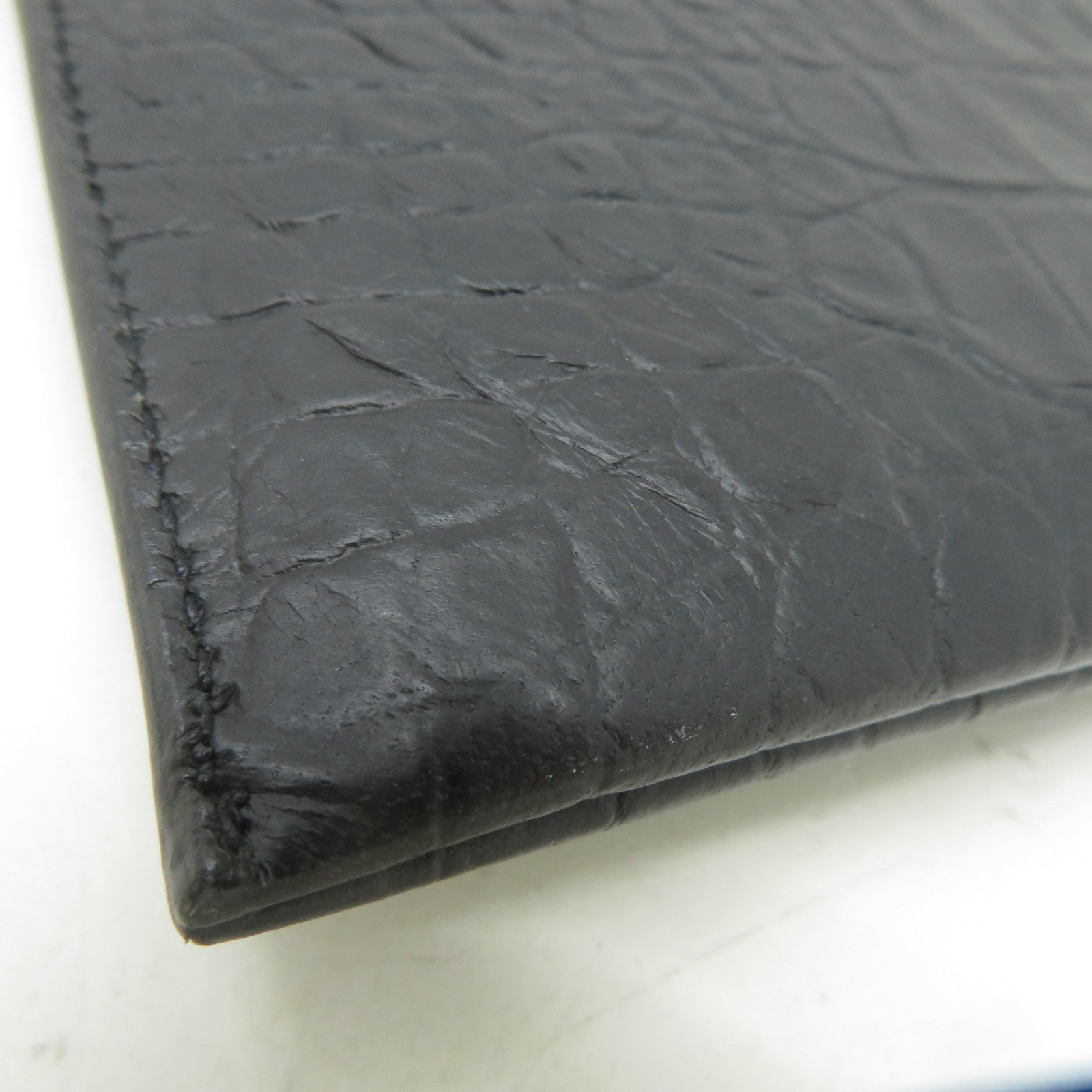 SAINT LAURENT 皮革Clutch Bag黑扣手拿包黑色