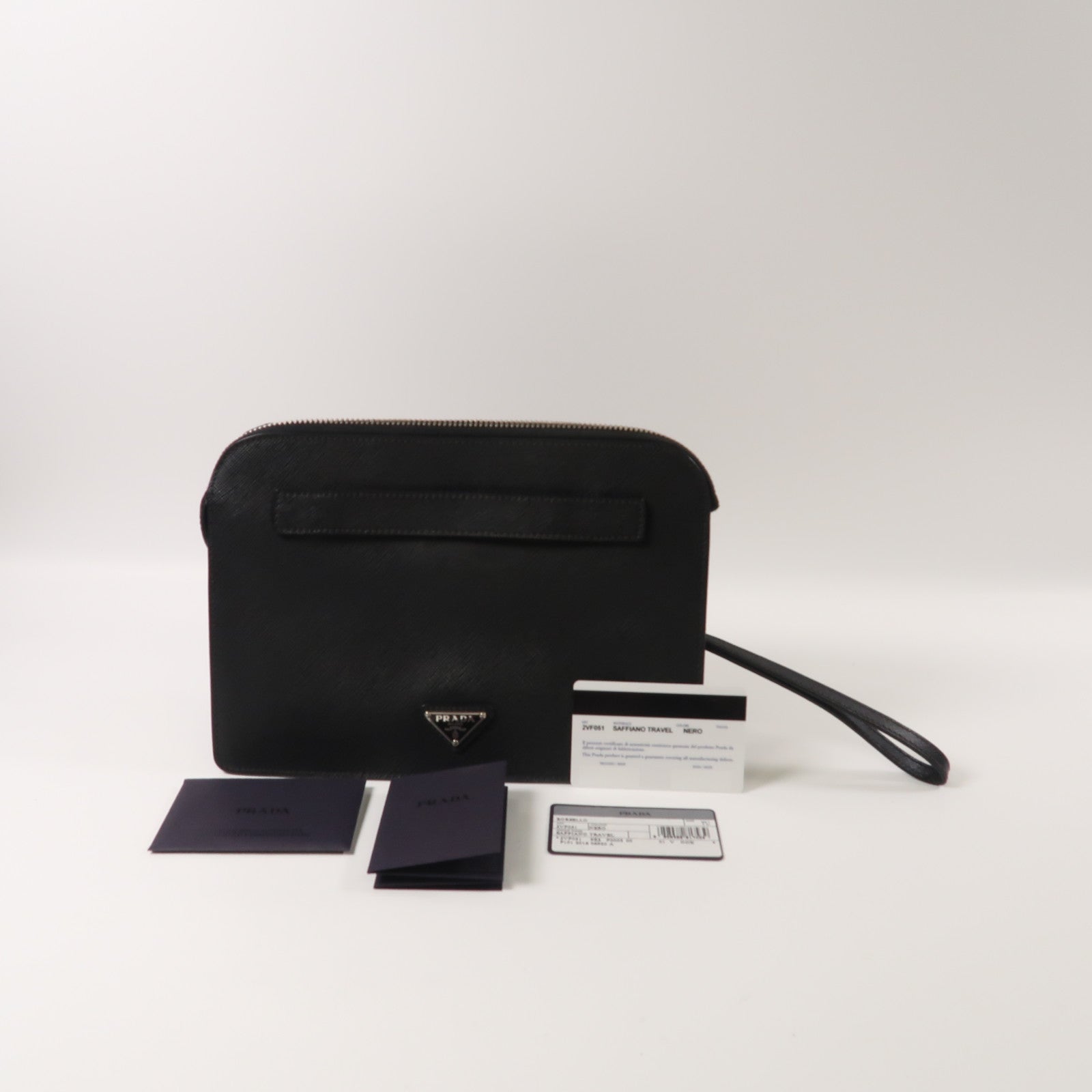 PRADA 牛皮皮革Saffiano Travel銀扣手拿包黑色