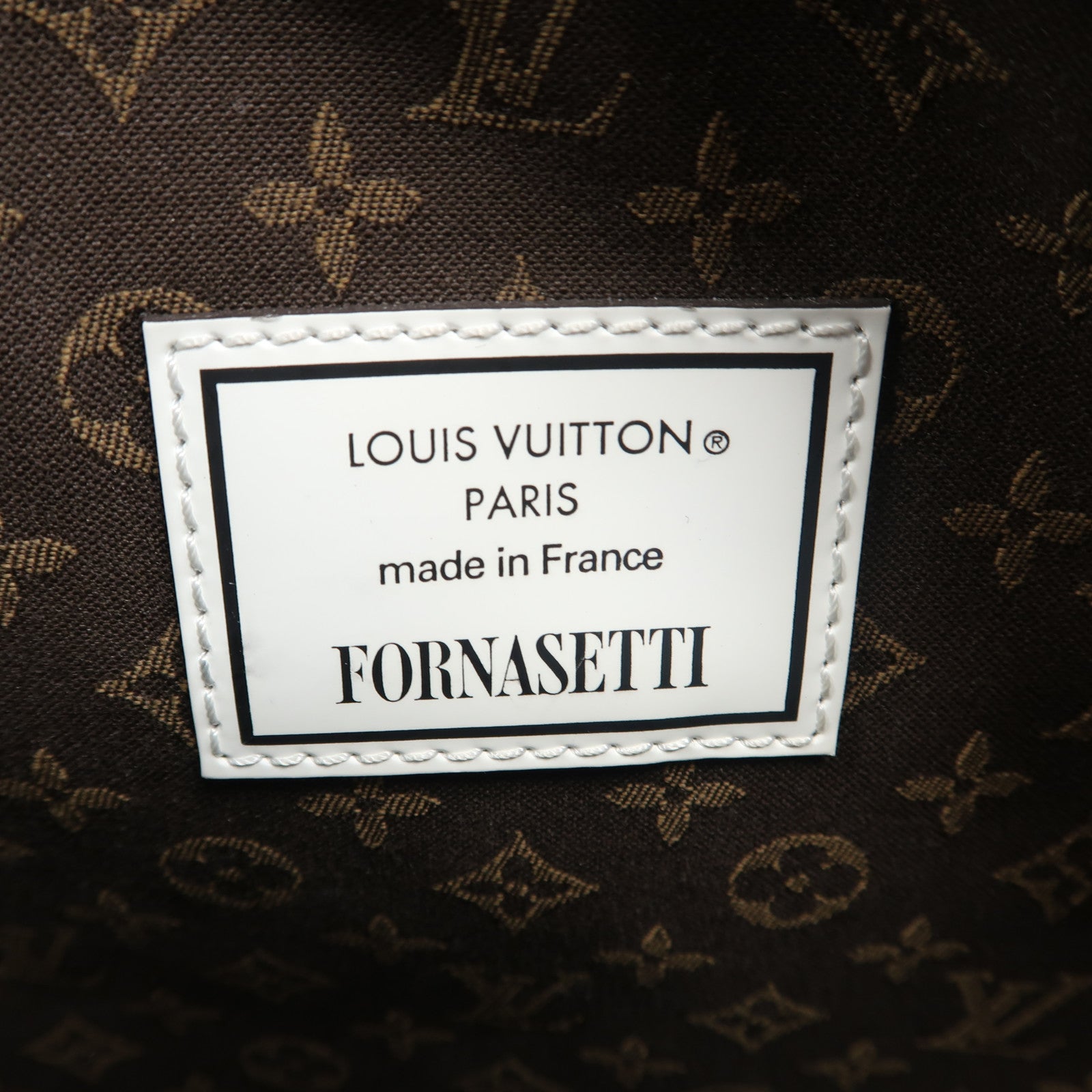 LOUIS VUITTON 塗層帆布Fornasetti Pochette Tete金扣肩背袋白色/紅色