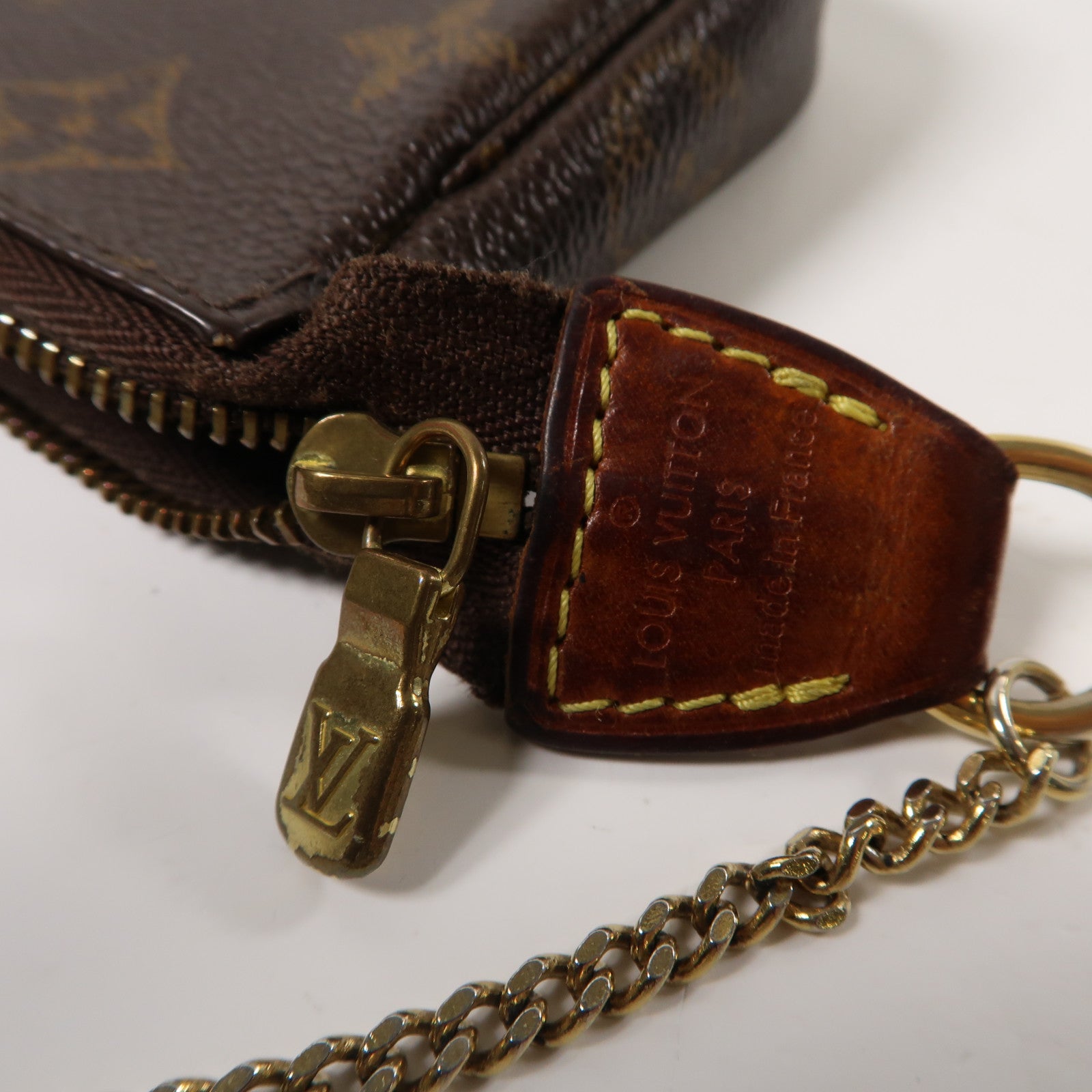LOUIS VUITTON Monogram Mini Pochette Accessoires金扣手拿包啡色