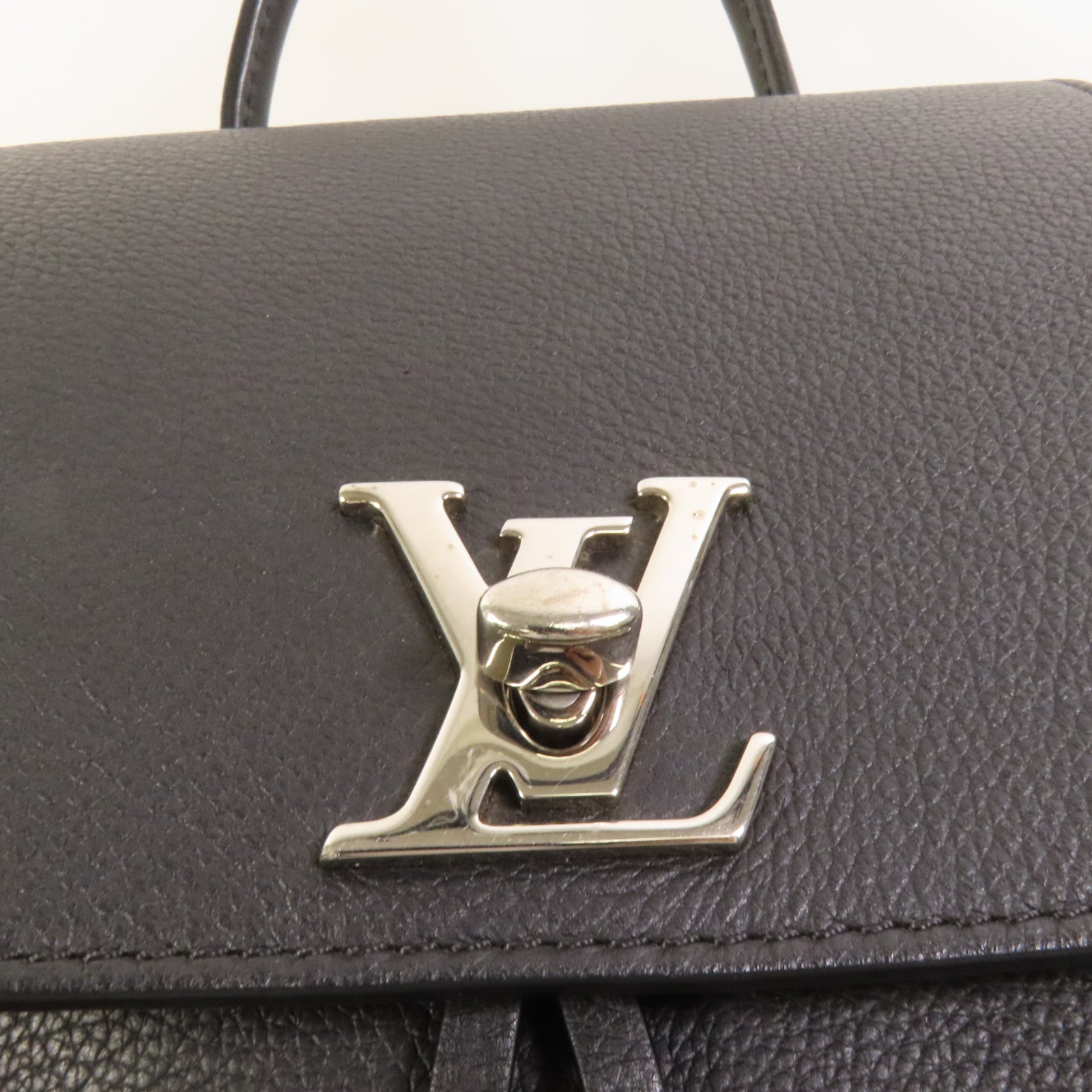 LOUIS VUITTON 【激減優惠】牛皮皮革Lock Me Backpack銀扣背包