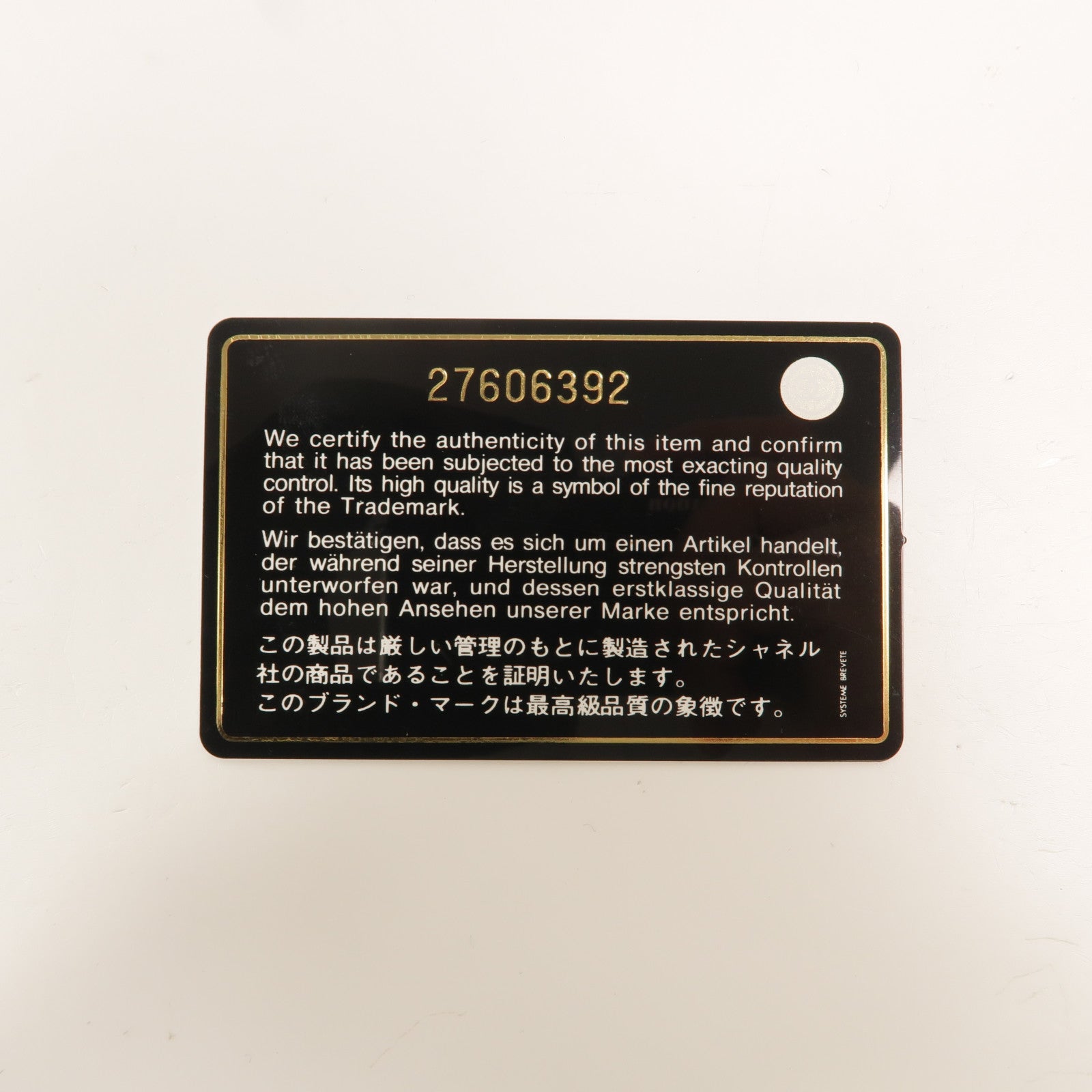 CHANEL 羊皮皮革Camellia Clutch長錢包