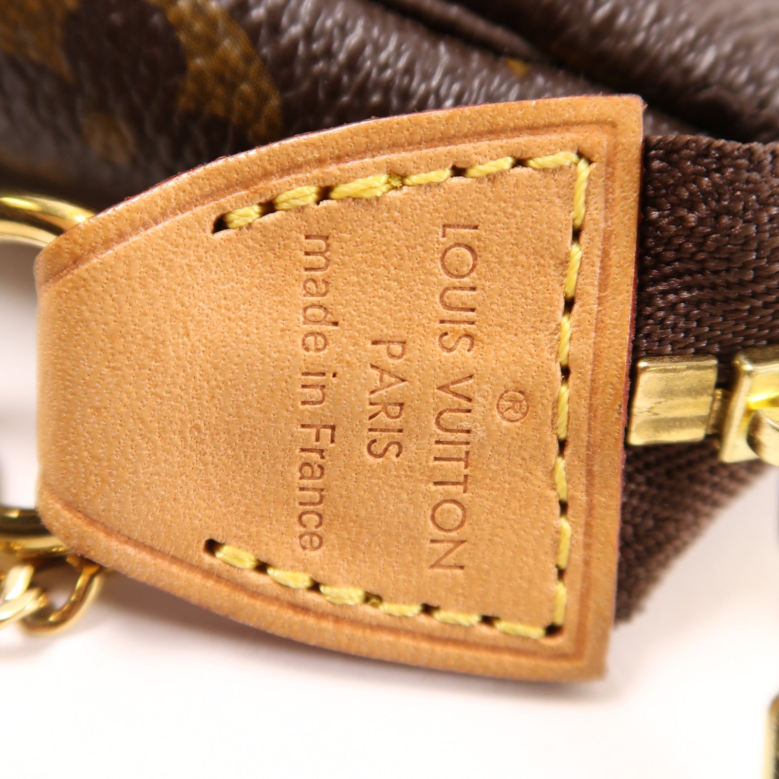 LOUIS VUITTON Monogram Mini Pochette Accessoires金扣手挽袋棕色