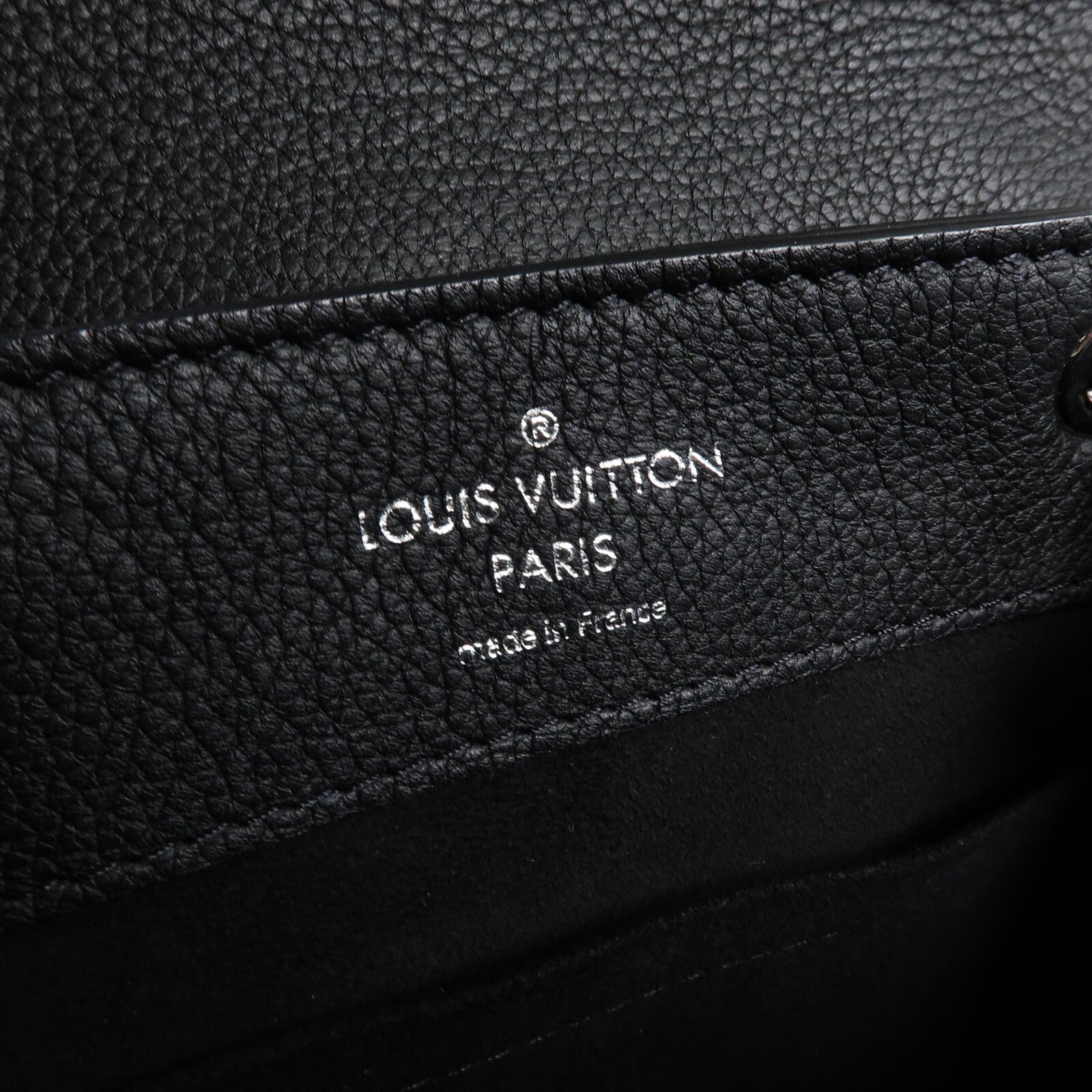 LOUIS VUITTON 牛皮皮革Lock Me Backpack背包